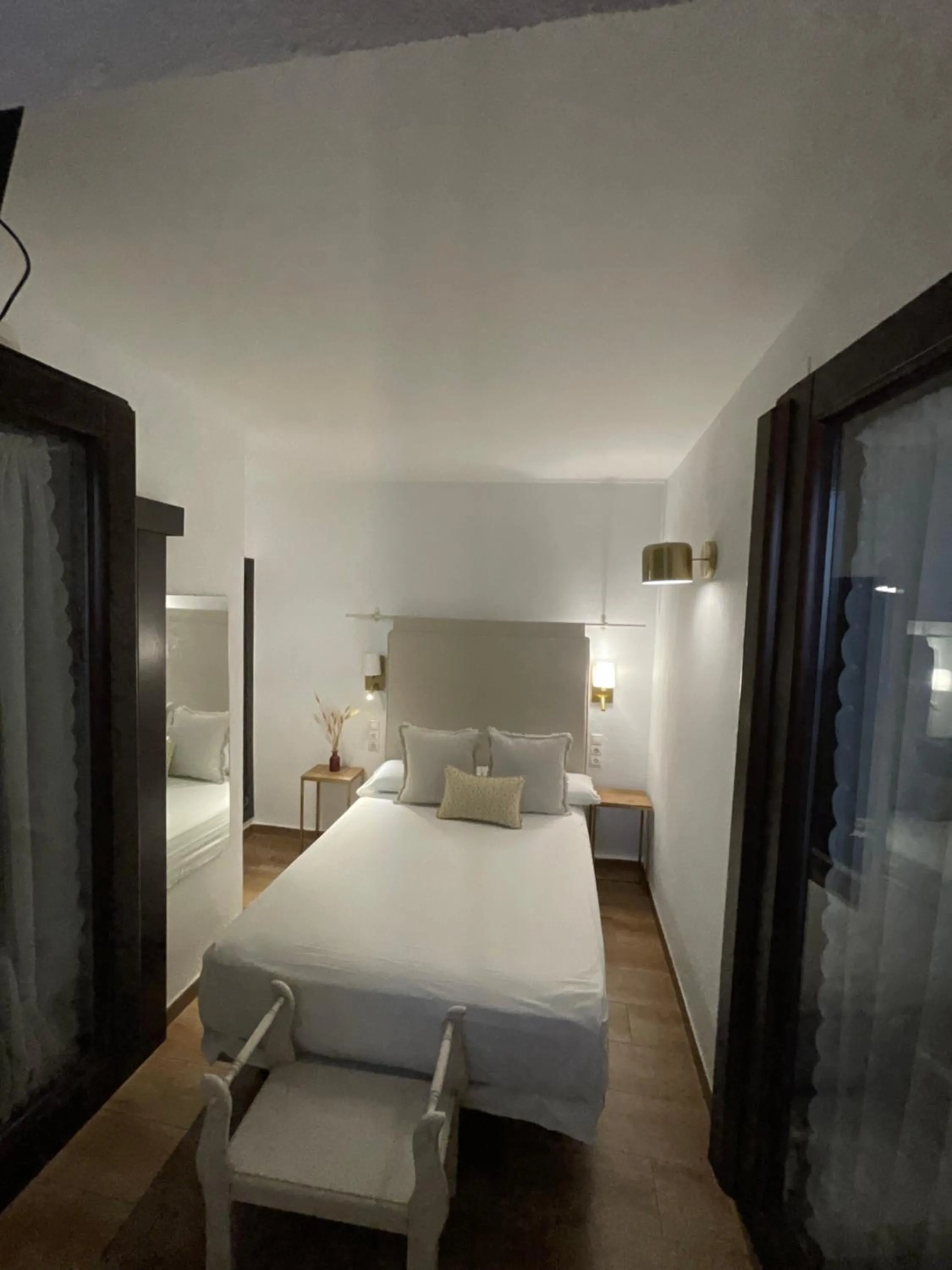 Bed in HOTEL BOUTIQUE ALMA ANDALUSí