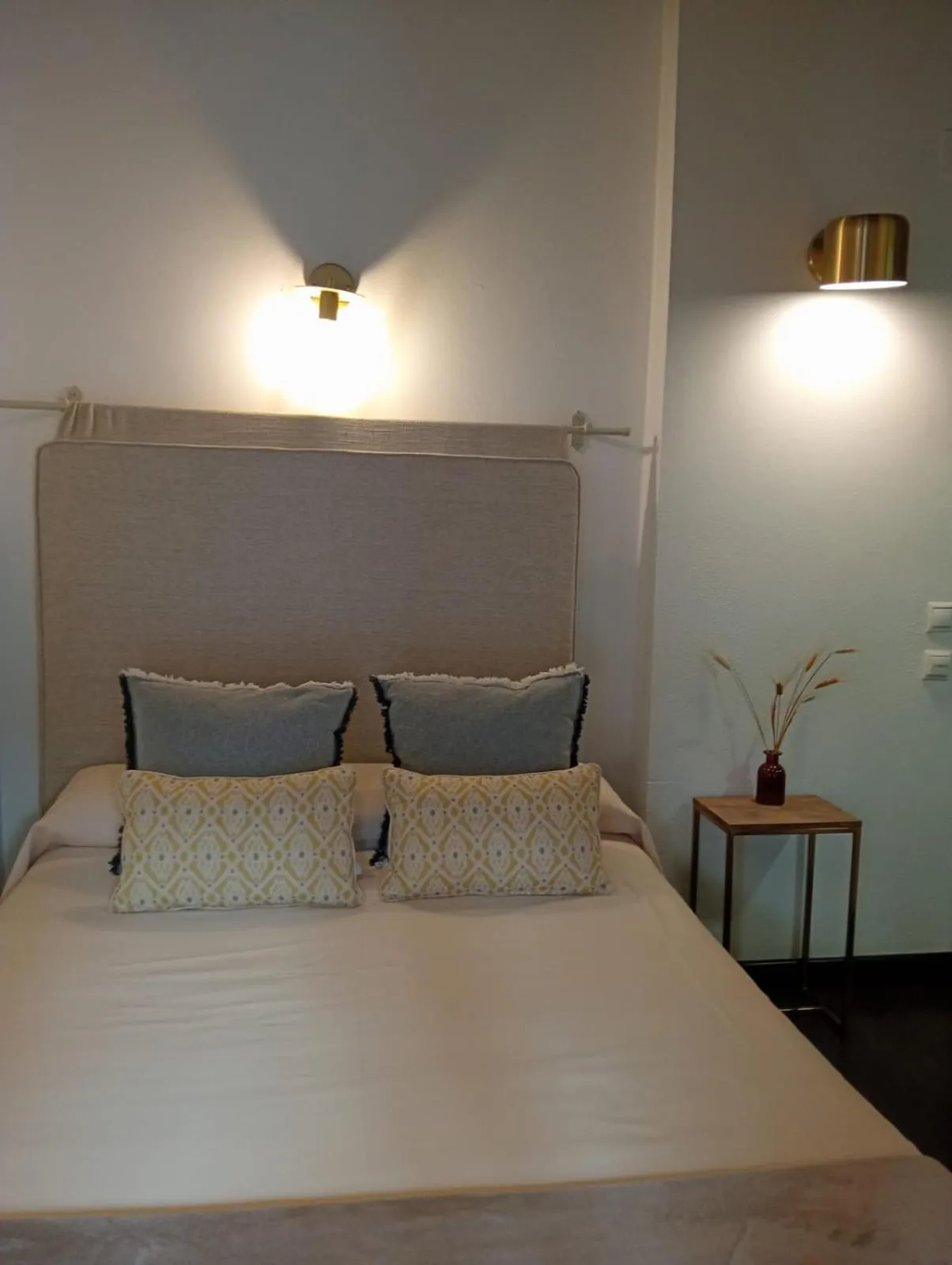 Bed in HOTEL BOUTIQUE ALMA ANDALUSí