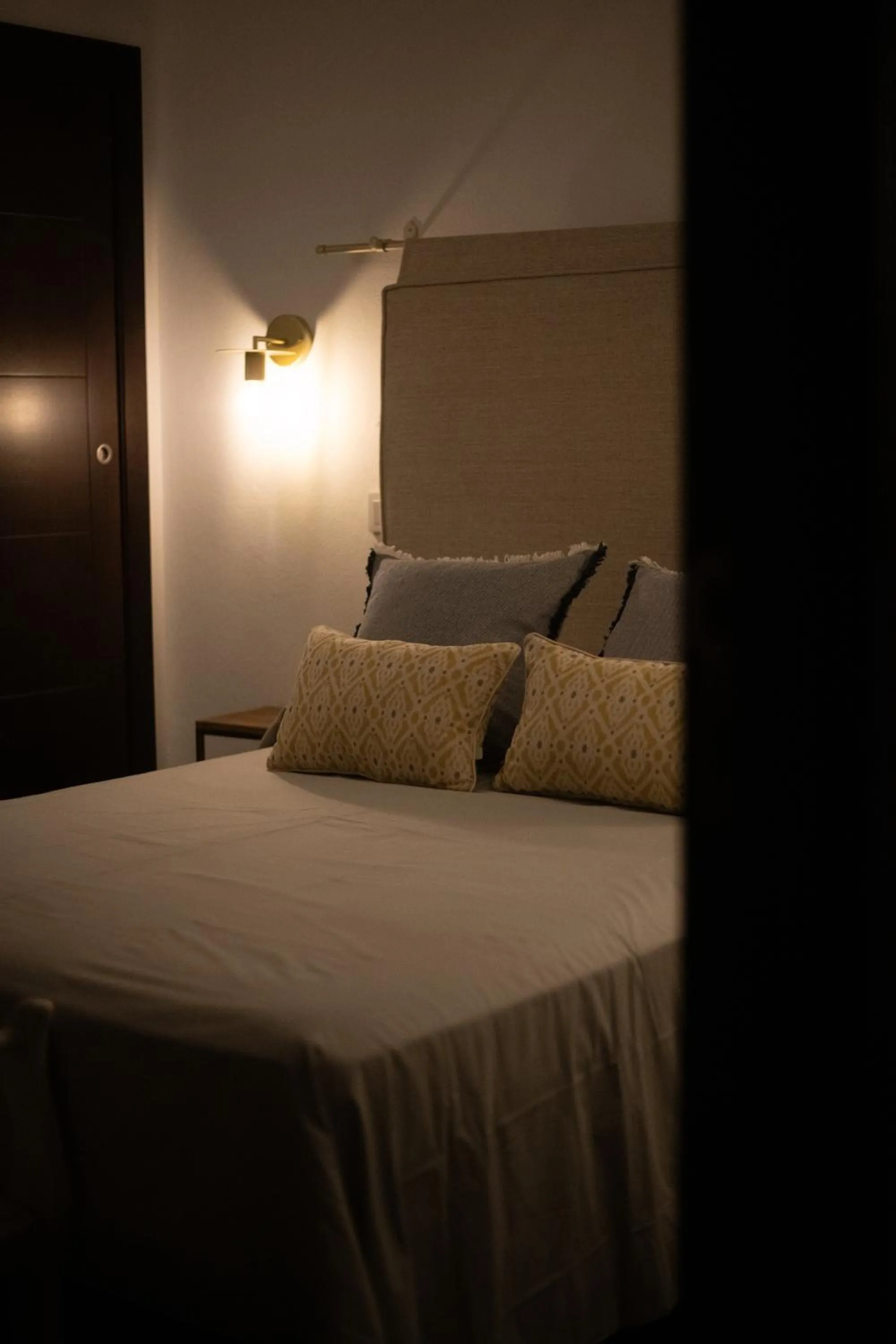 Bed in HOTEL BOUTIQUE ALMA ANDALUSí