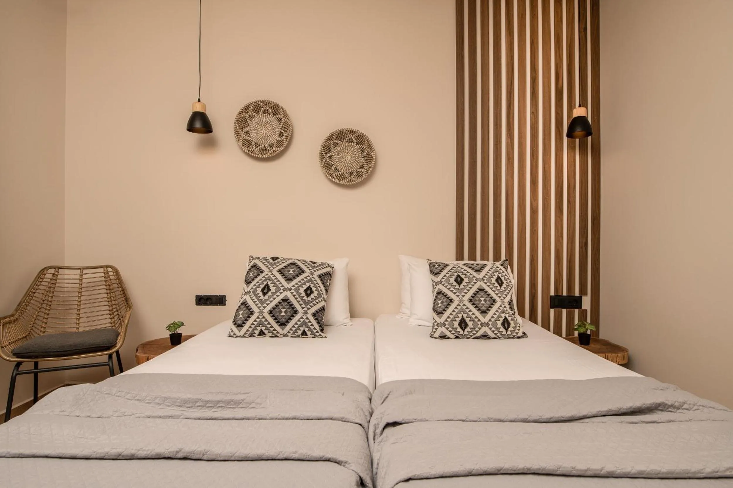Bed in Aeolos Boutique Hotel & Suites