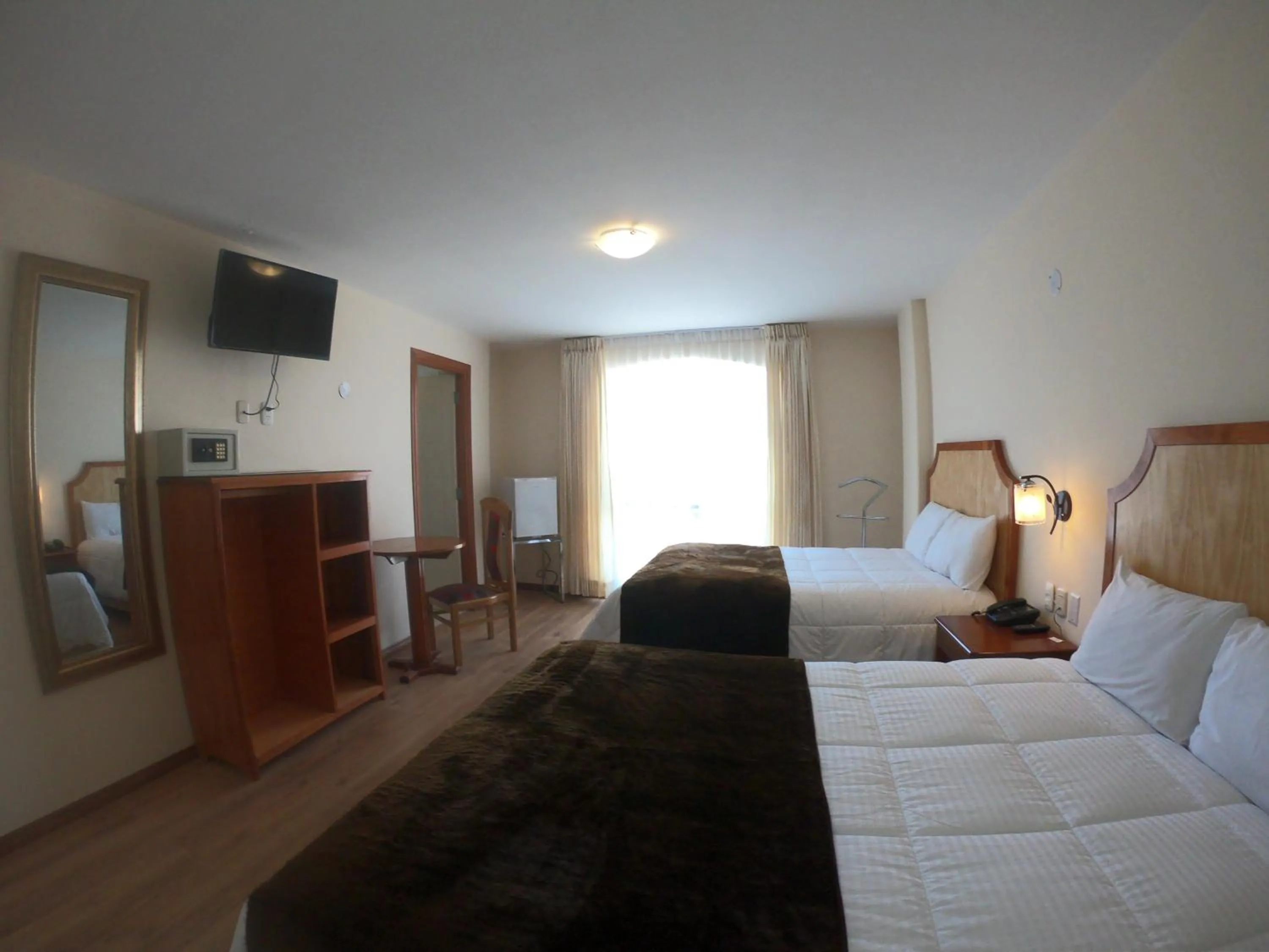 Bed in Sol Plaza Hotel