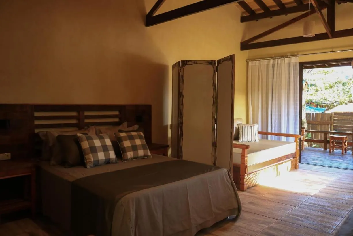 Bed in Complexo de Pousadas Caraguatá