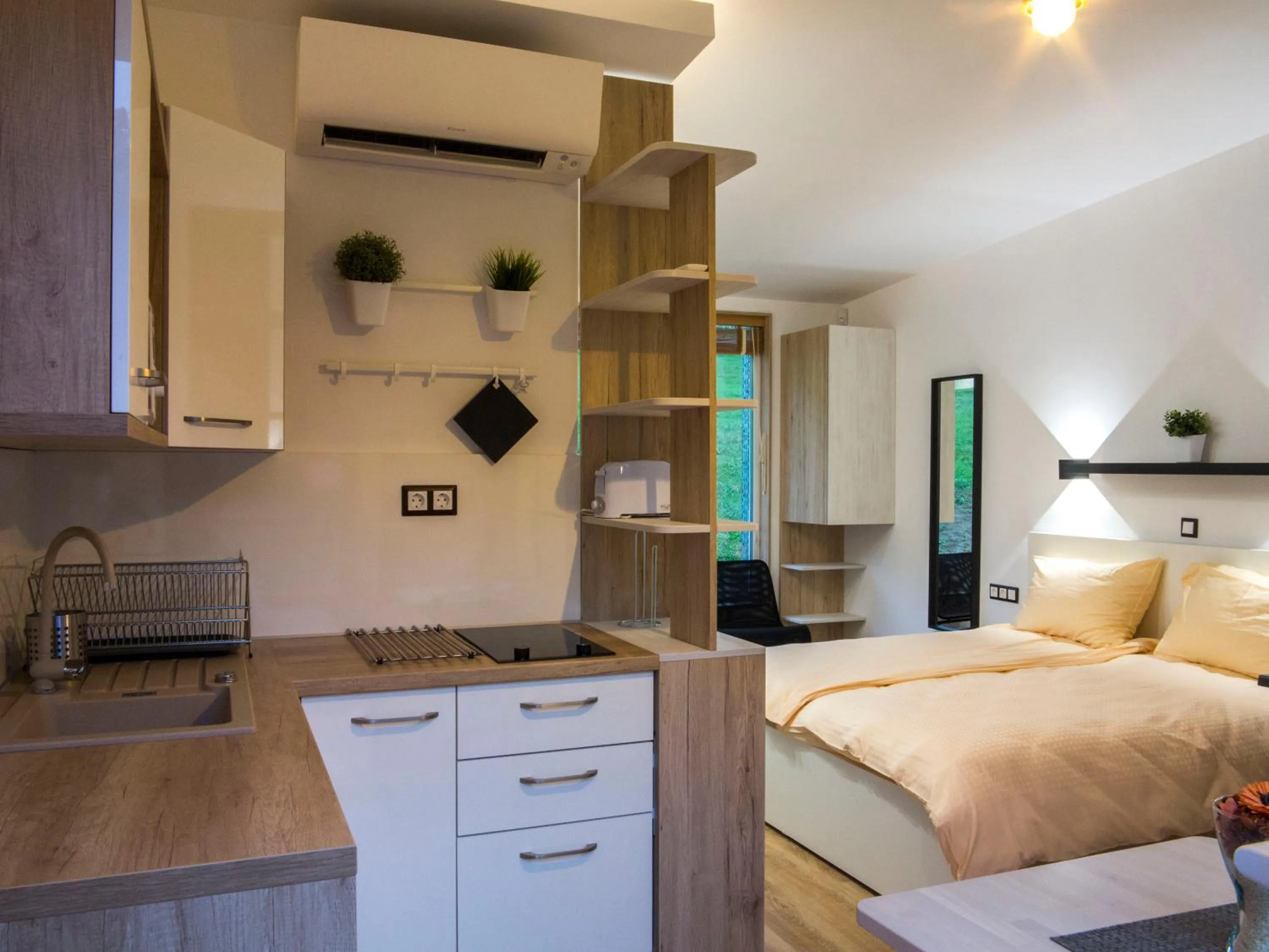 Kitchen or kitchenette, Bed in Naturasort Holiday Houses