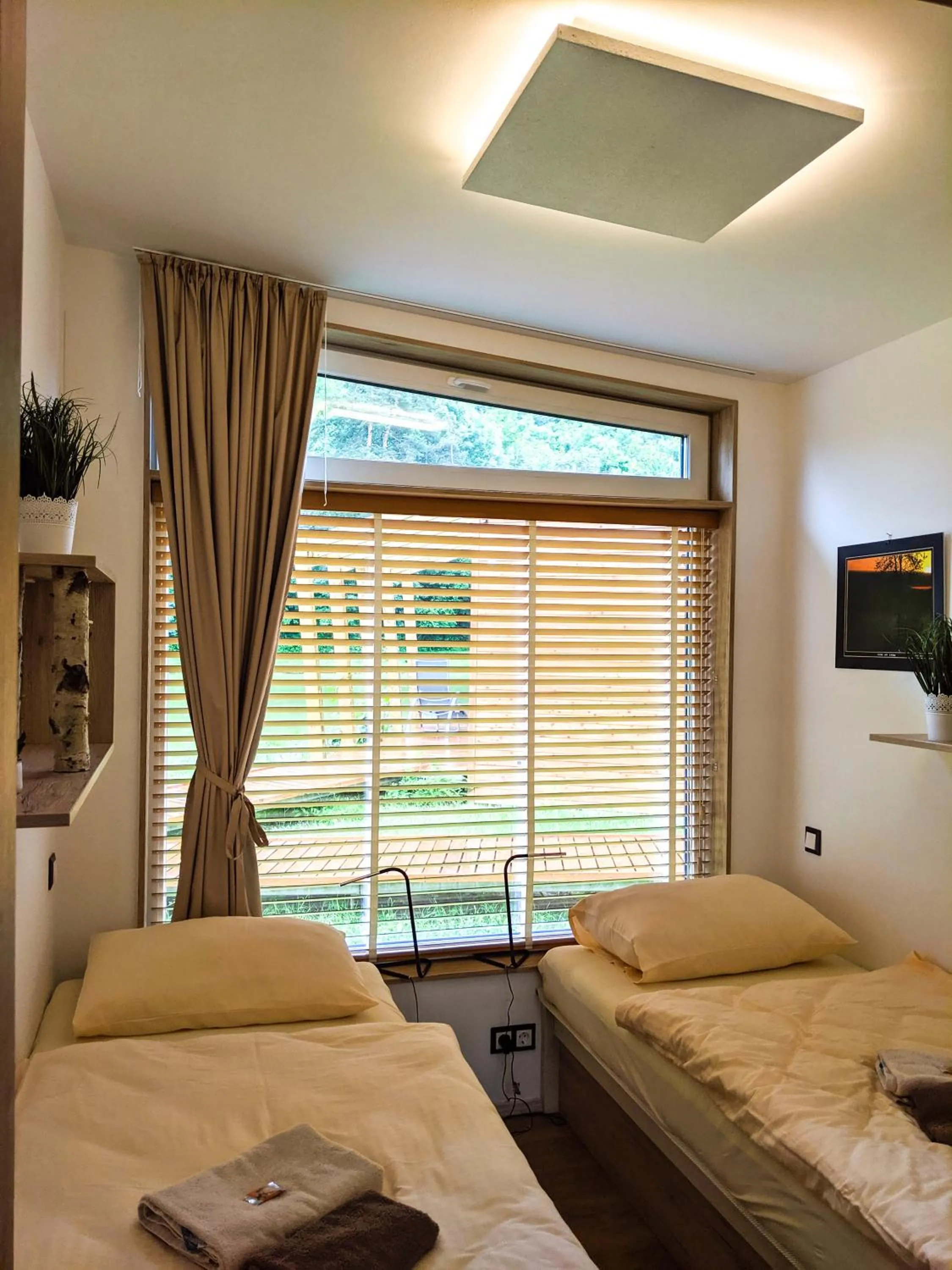 Bed in Naturasort Holiday Houses