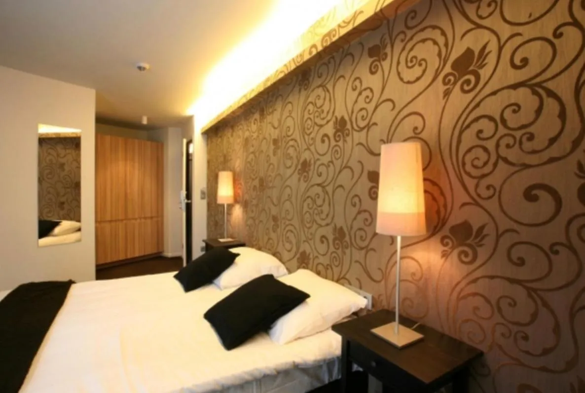 Bed in Hotel De Groene Hendrickx