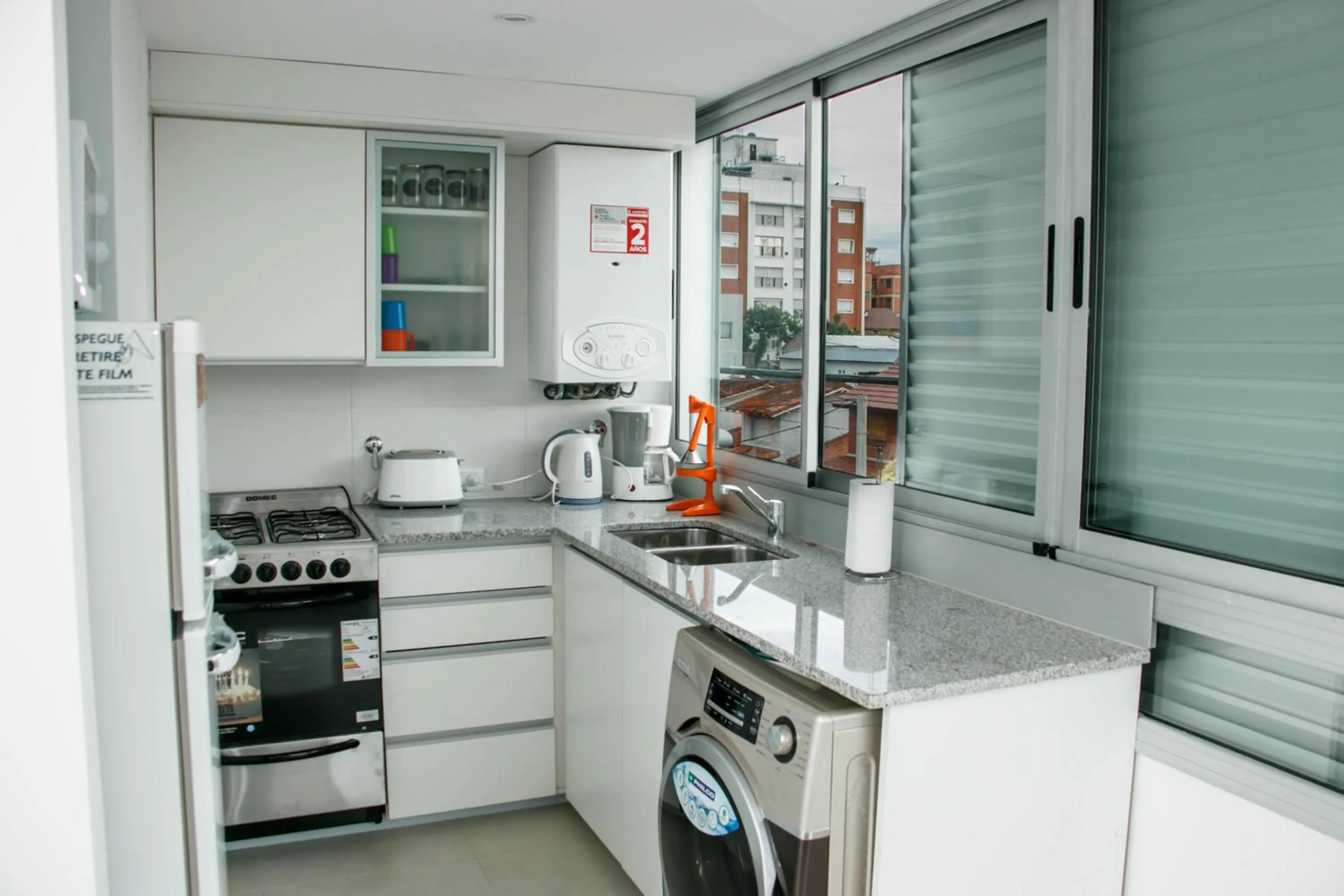 Communal kitchen in Los Asturianos APART amentos 1 y 2 Mar del Plata