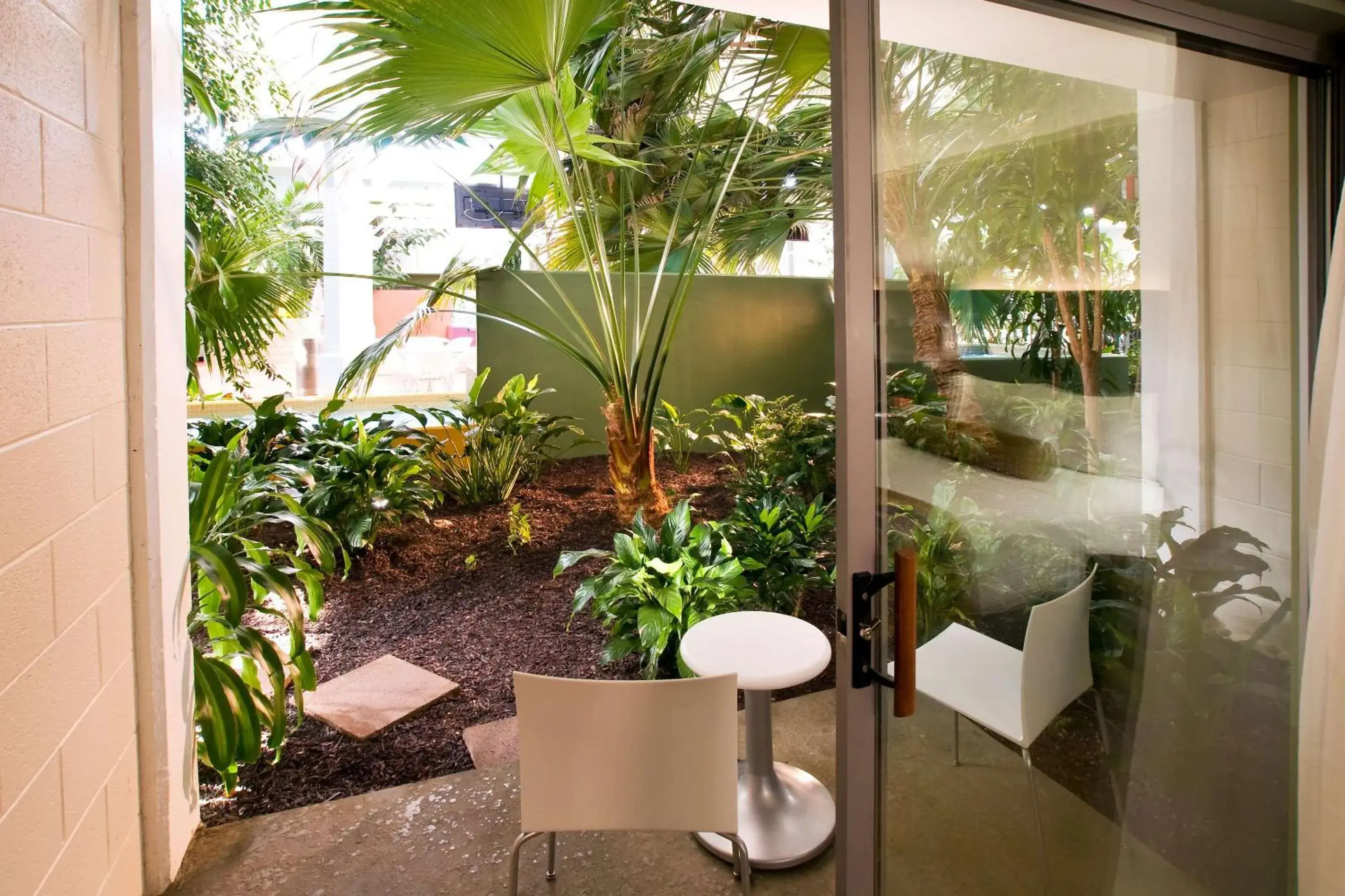 Bedroom in Oasis Hotel and Conv Center, an Ascend Collection Hotel Bedroom in Oasis Hotel and Conv Center, an Ascend Collection Hotel