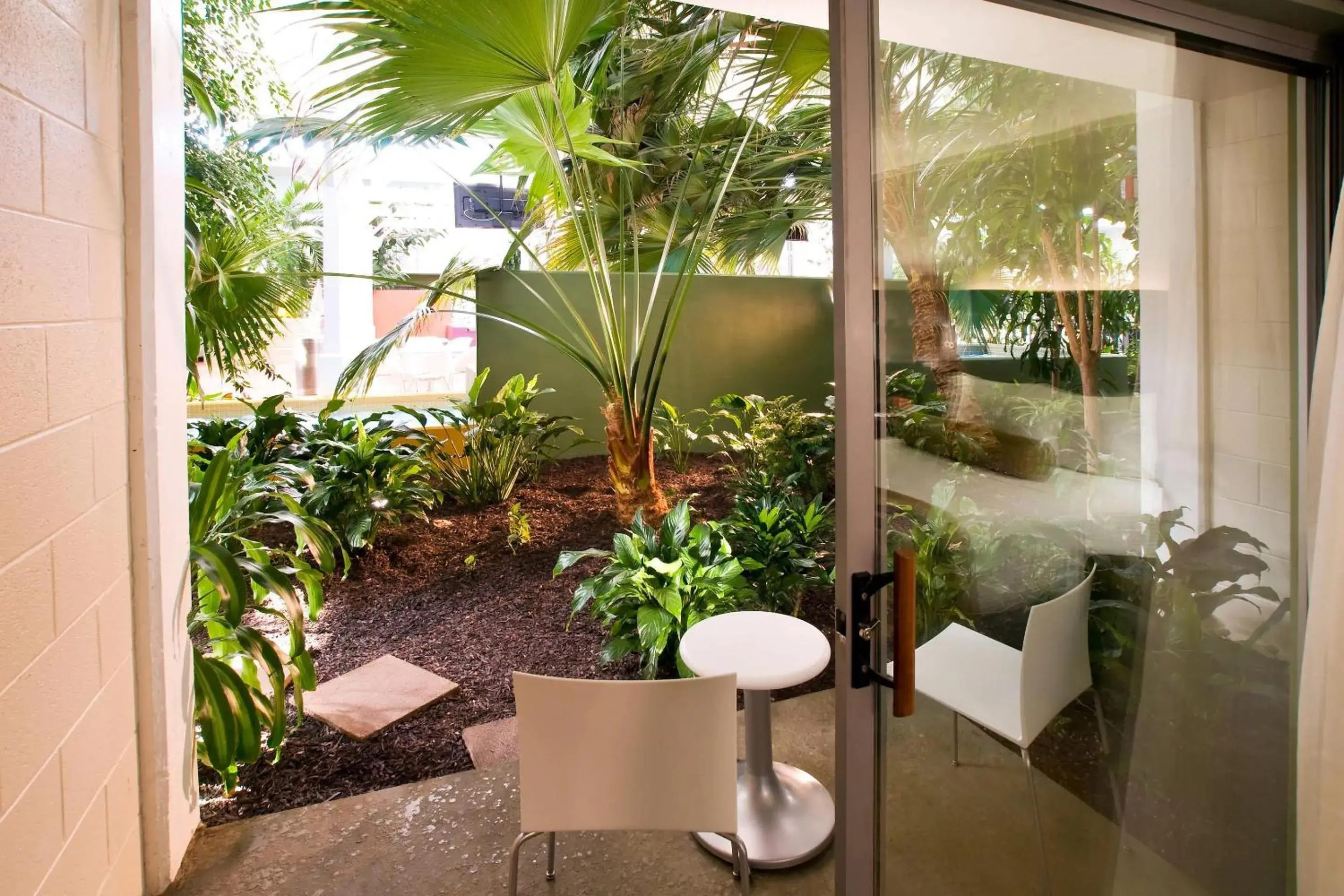 Bedroom in Oasis Hotel and Conv Center, an Ascend Collection Hotel Bedroom in Oasis Hotel and Conv Center, an Ascend Collection Hotel