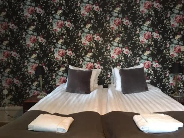 Bed in Morris Hotel