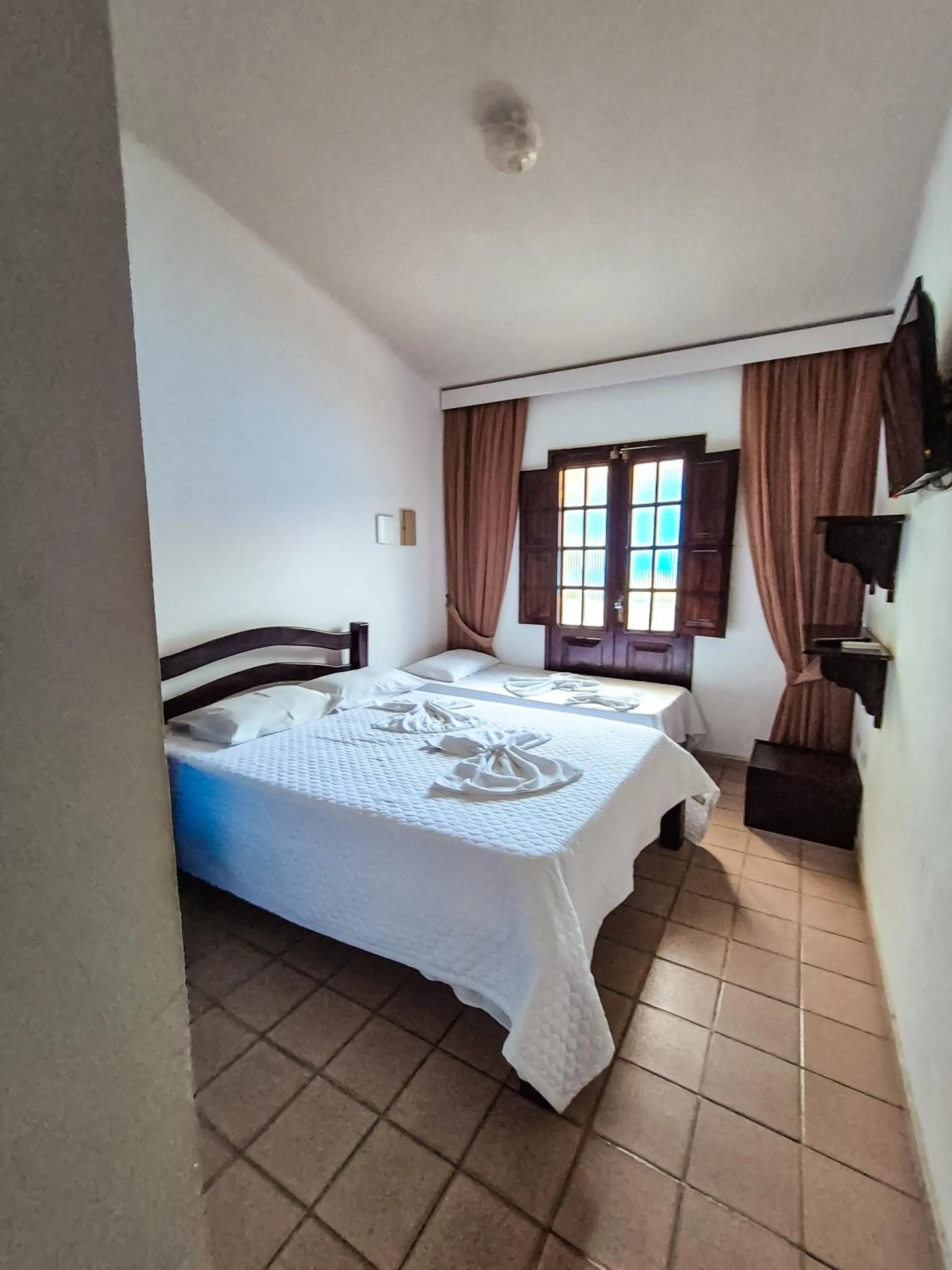 Bed in Pousada Morada Azul