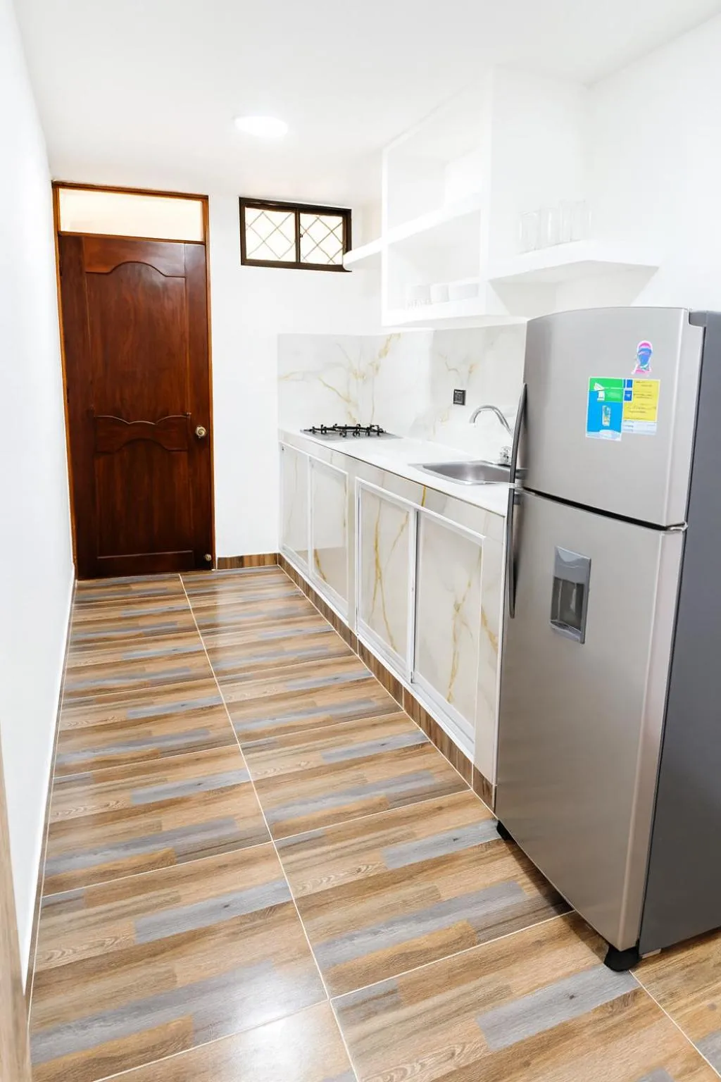 kitchen in Nabusimake Apartamentos By DANP