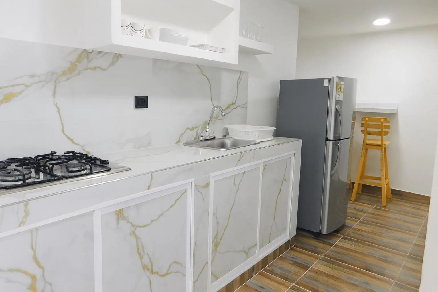 kitchen in Nabusimake Apartamentos By DANP