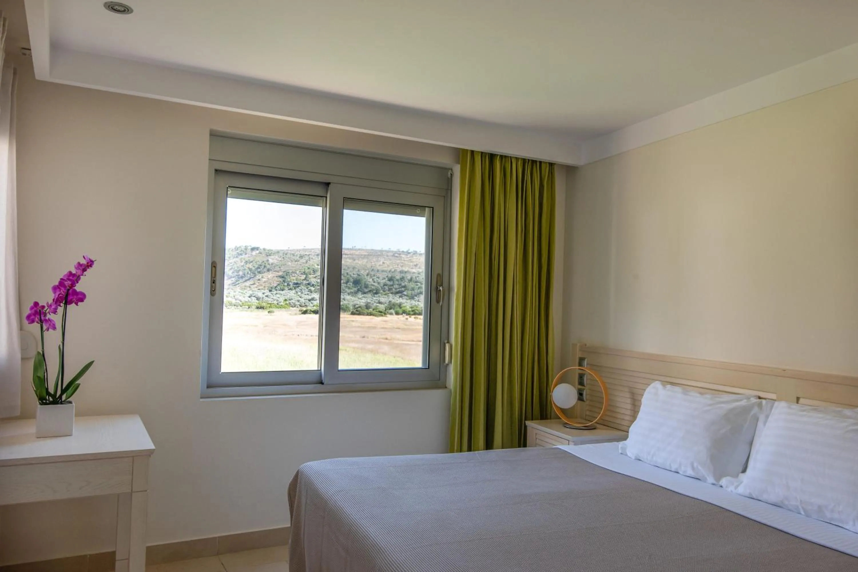 Bed in Almiriki Chios Rooms & Apartments