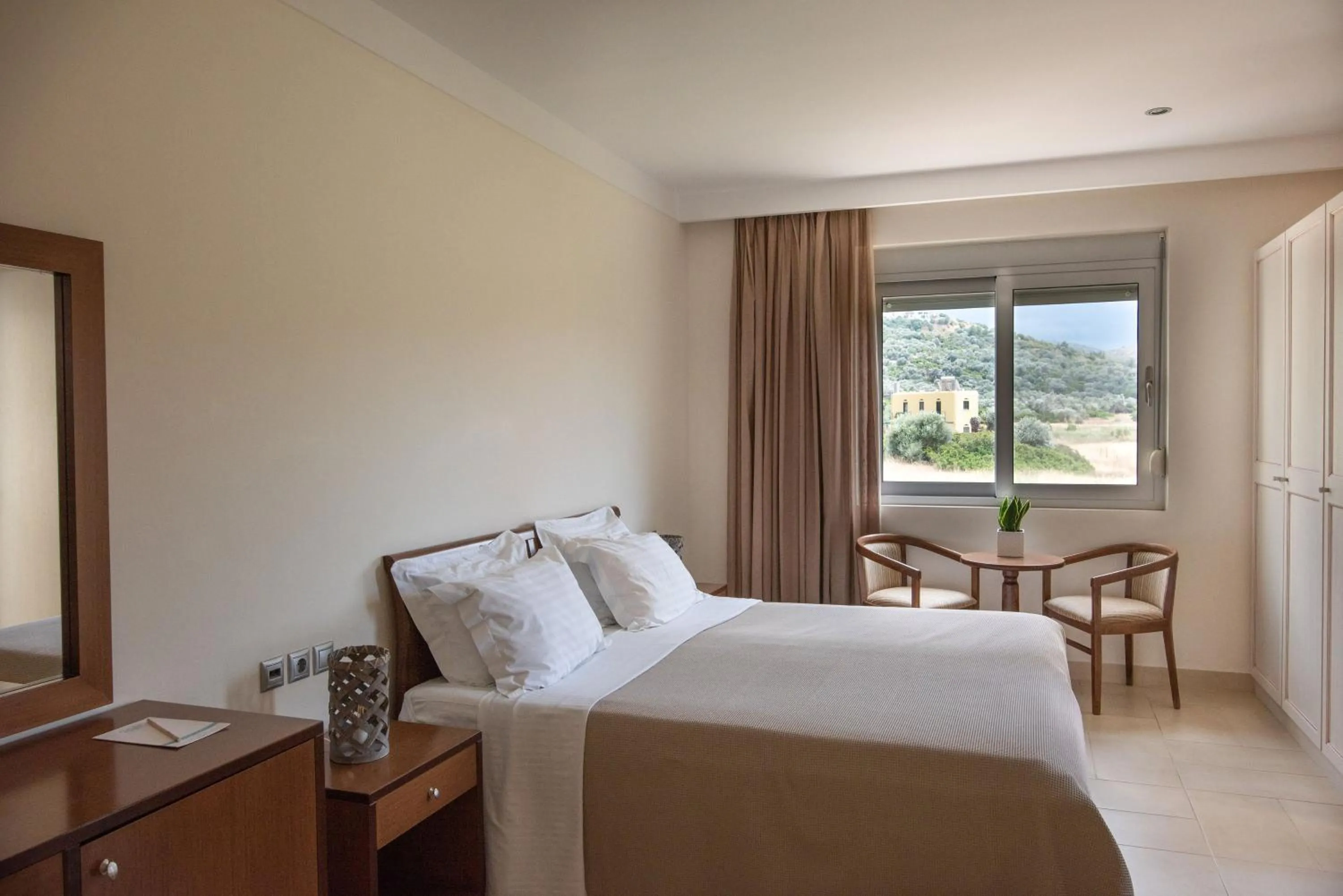 Bed in Almiriki Chios Rooms & Apartments