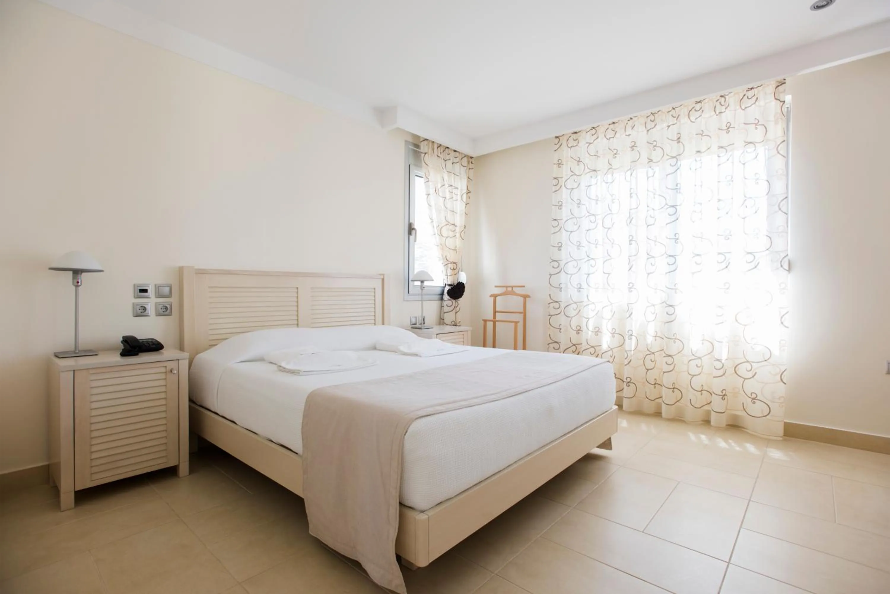 Bed in Almiriki Chios Rooms & Apartments