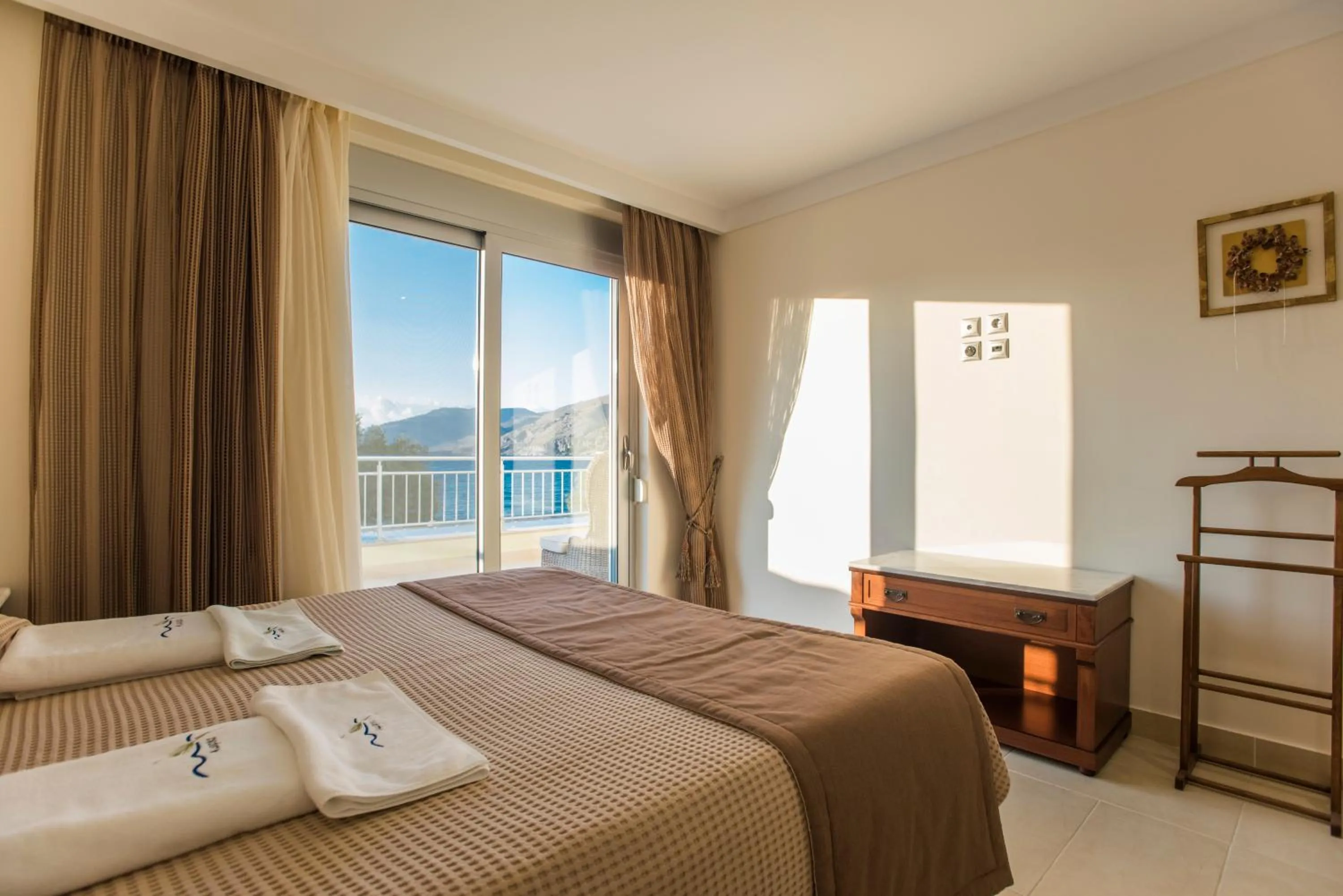 Bed in Almiriki Chios Rooms & Apartments