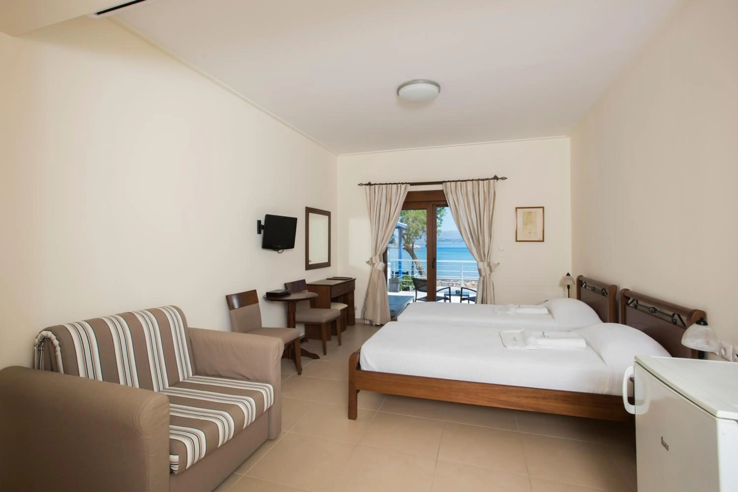 Photo of the whole room, Bed in Almiriki Chios Rooms & Apartments