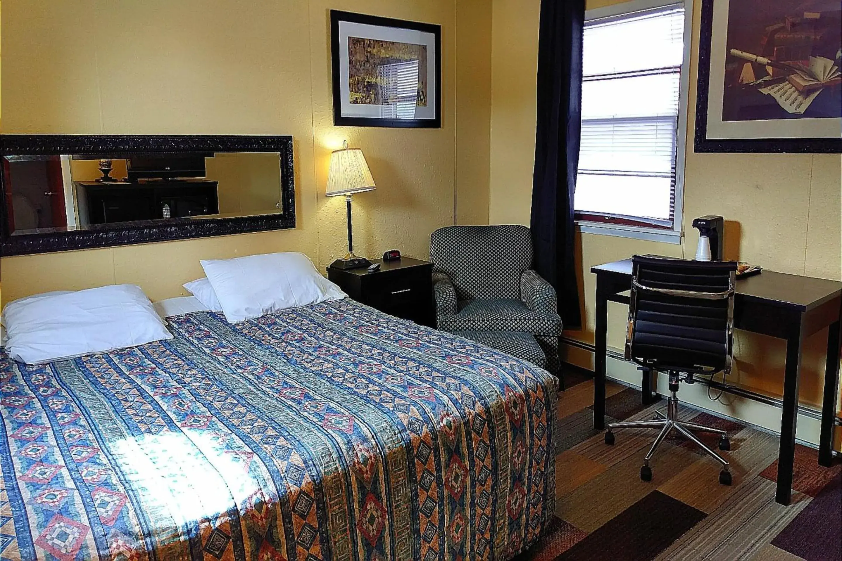 Bedroom, Bed in Colonial Inn Extended Stay by OYO New Ulm Bedroom, Bed in Colonial Inn Extended Stay by OYO New Ulm