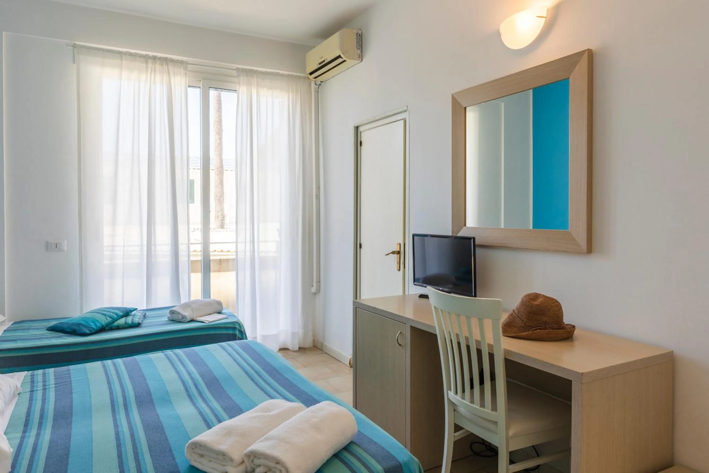 Bed in Hotel Baia Del Sole