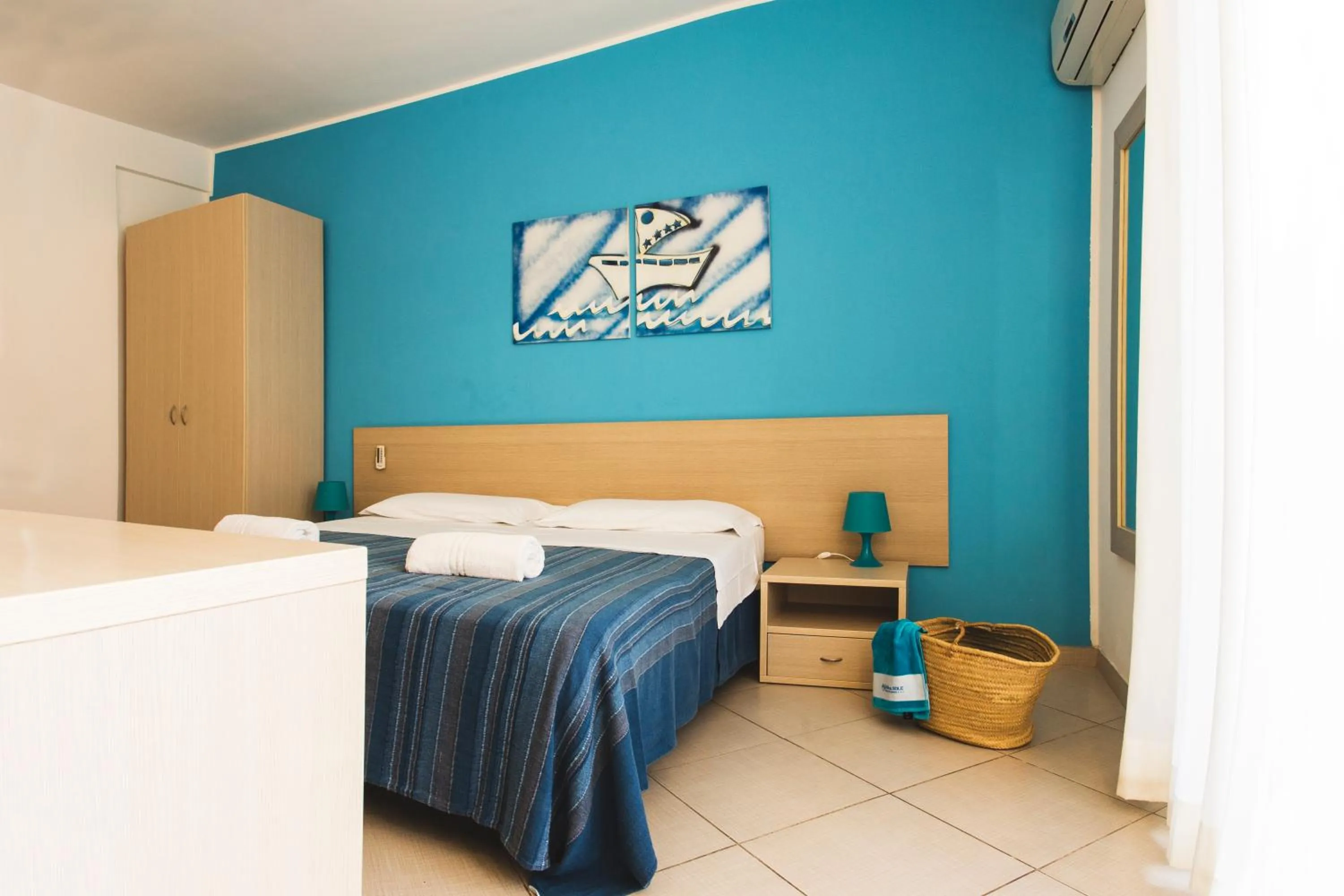 Bed in Hotel Baia Del Sole