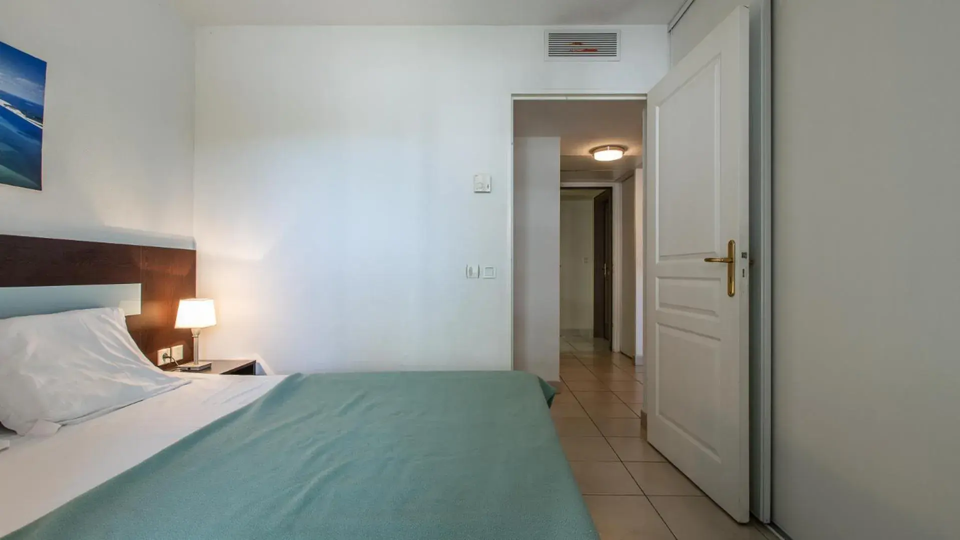 Bedroom, Bed in Vacancéole - Résidence Le Crystal Bedroom, Bed in Vacancéole - Résidence Le Crystal