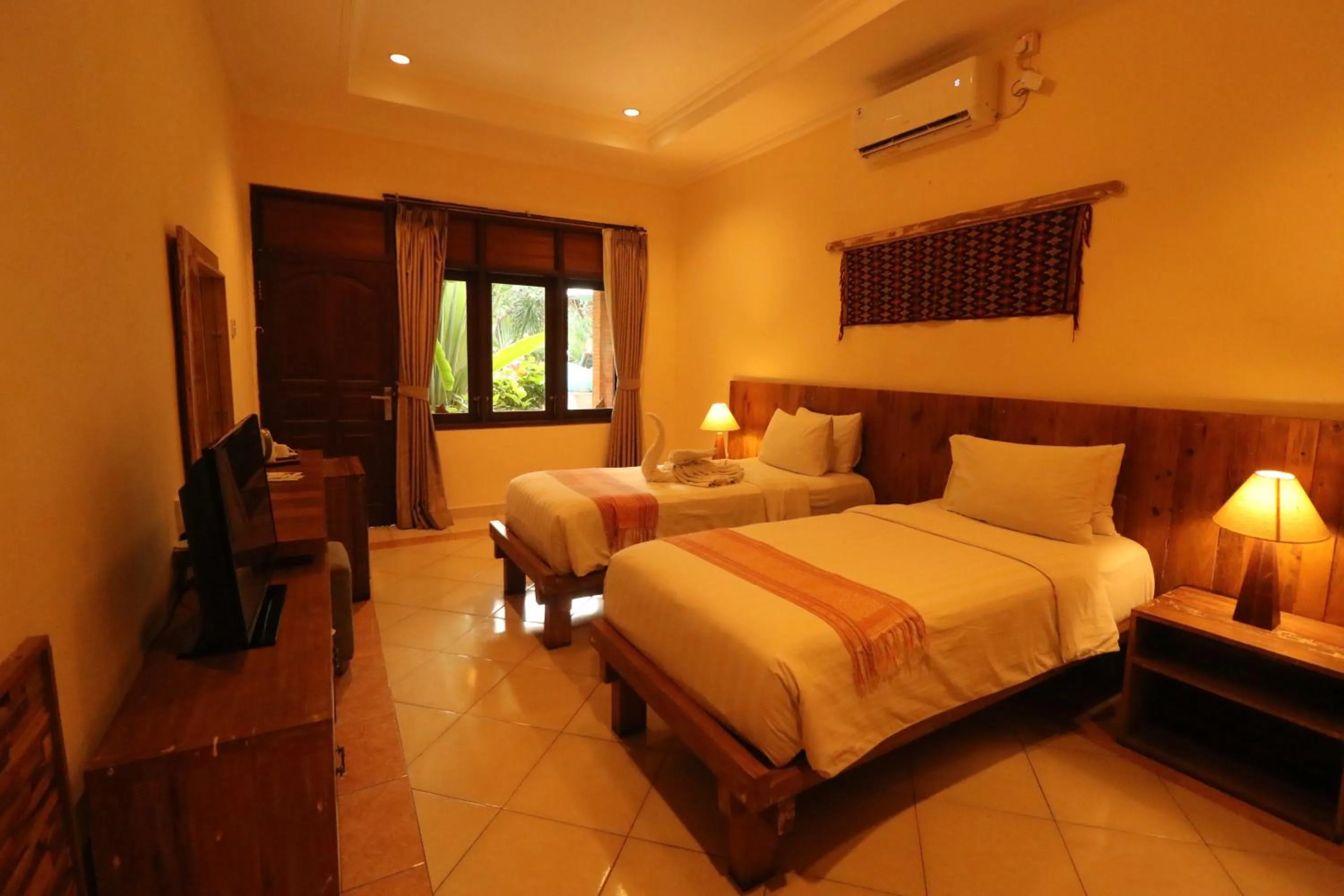 Bed in Mina Pelasa Hotel