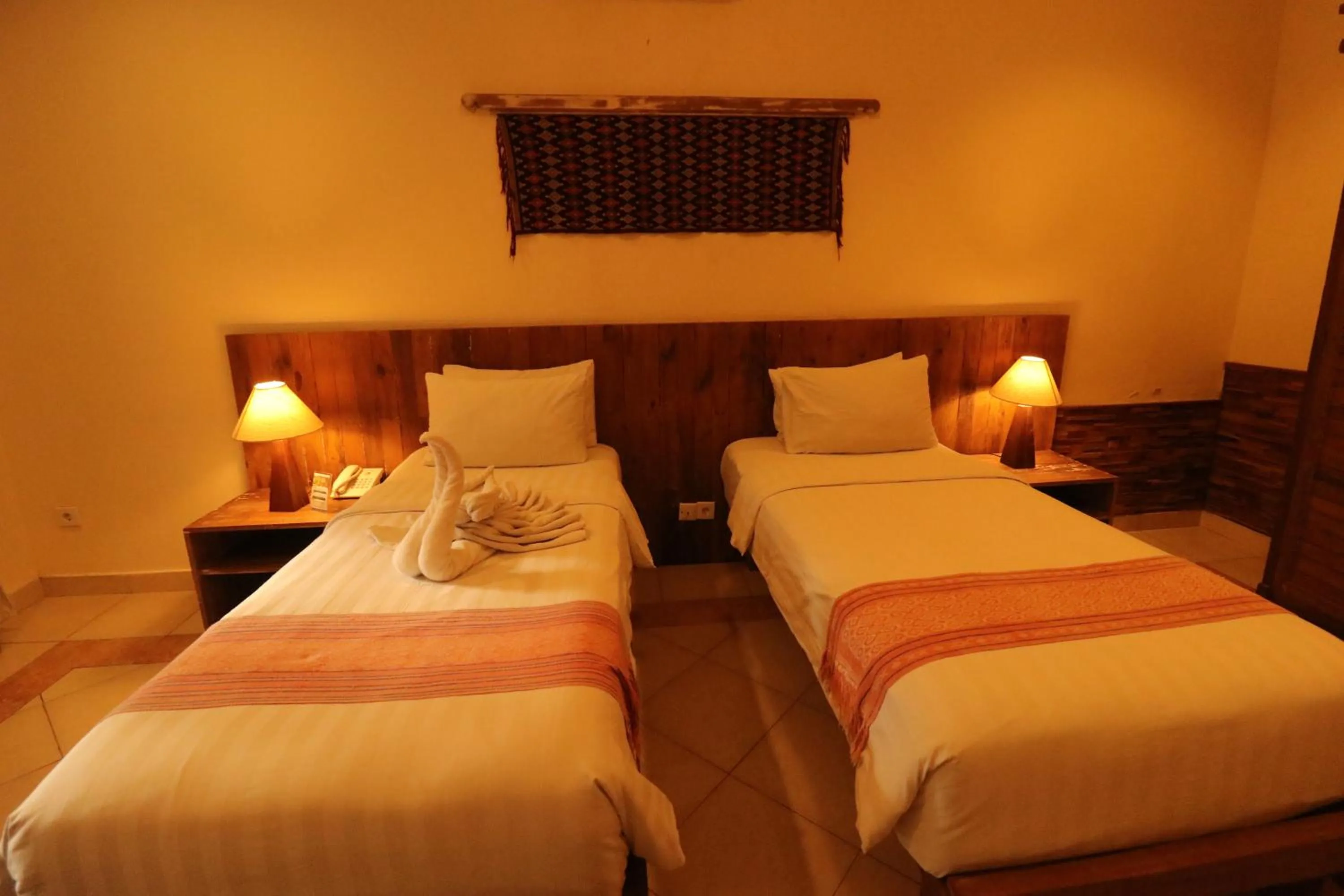 Bed in Mina Pelasa Hotel