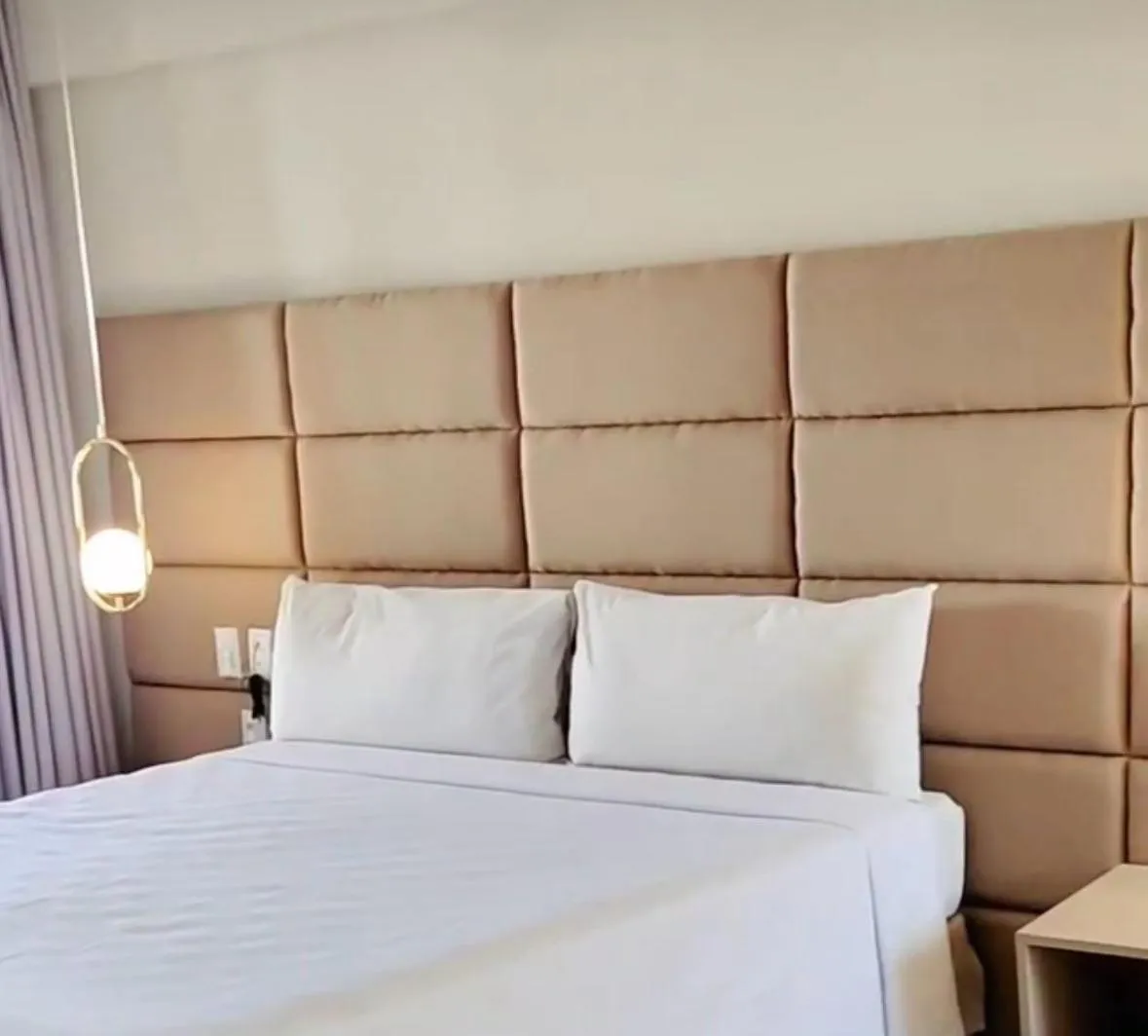 Bed in SAN MARINO SUITES HOTEL By NOBILE