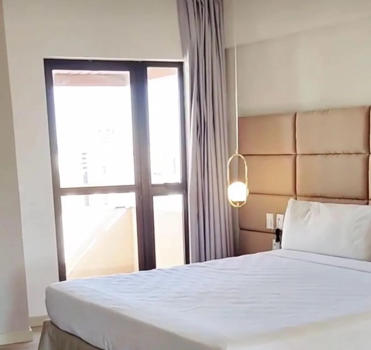 Bed in SAN MARINO SUITES HOTEL By NOBILE