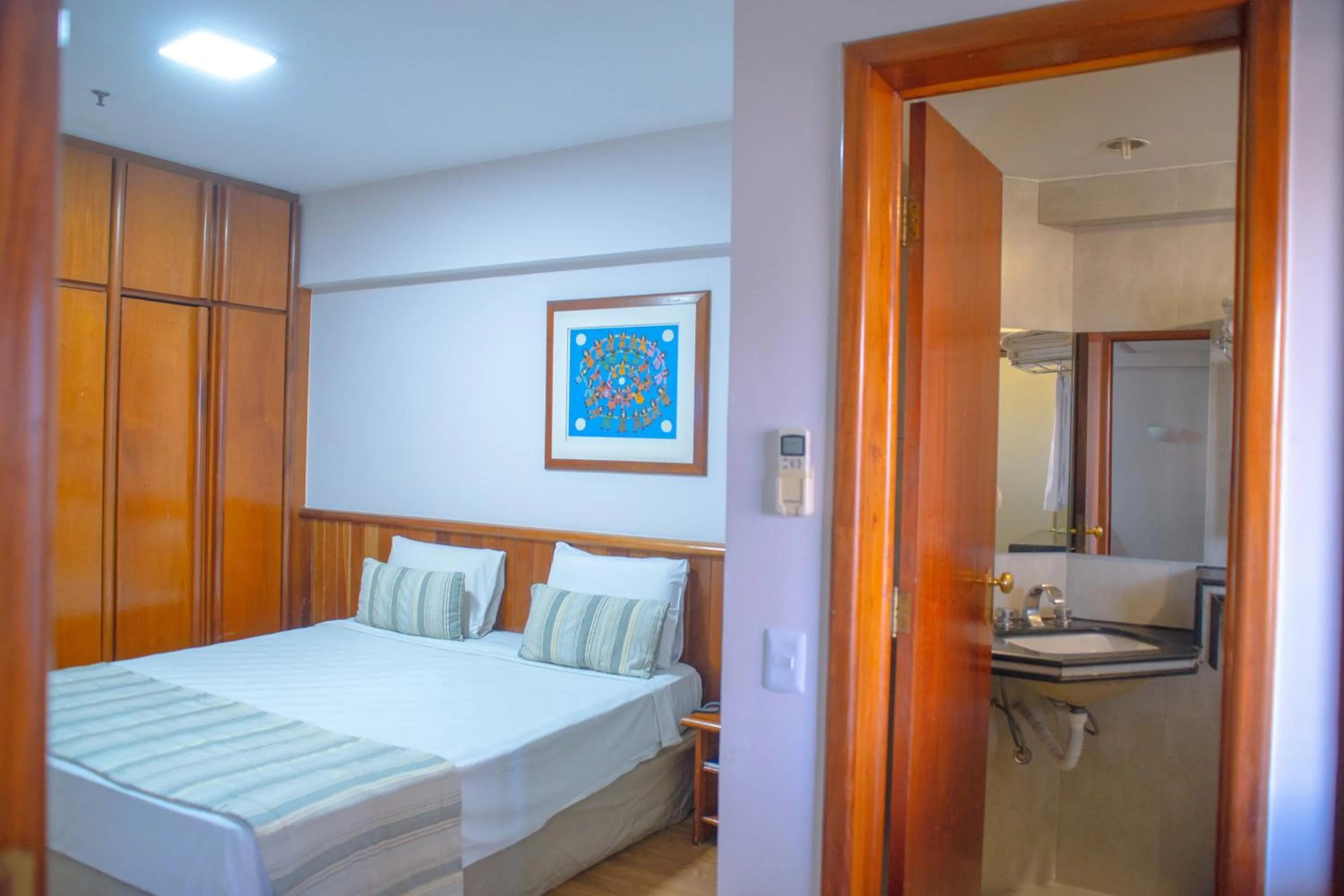 Bed in SAN MARINO SUITES HOTEL By NOBILE