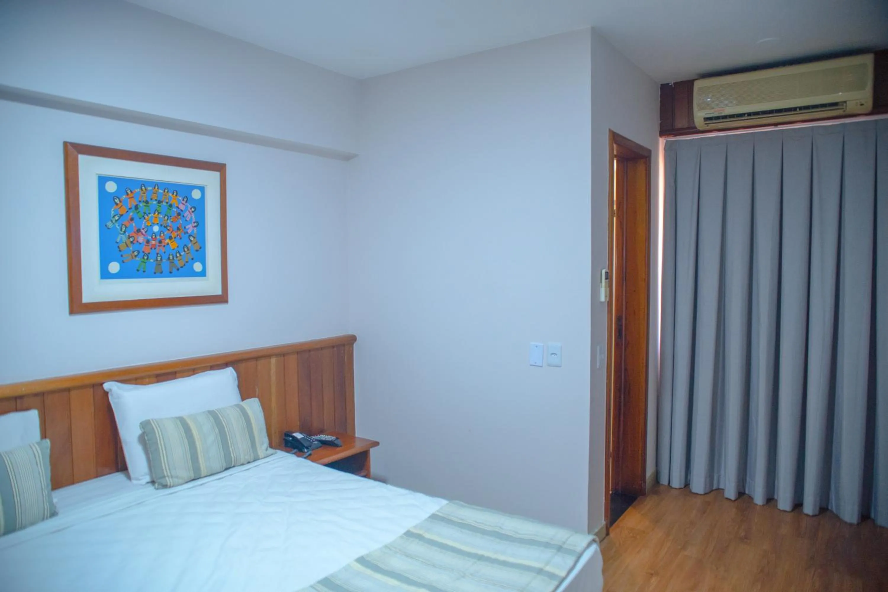 Bed in SAN MARINO SUITES HOTEL By NOBILE