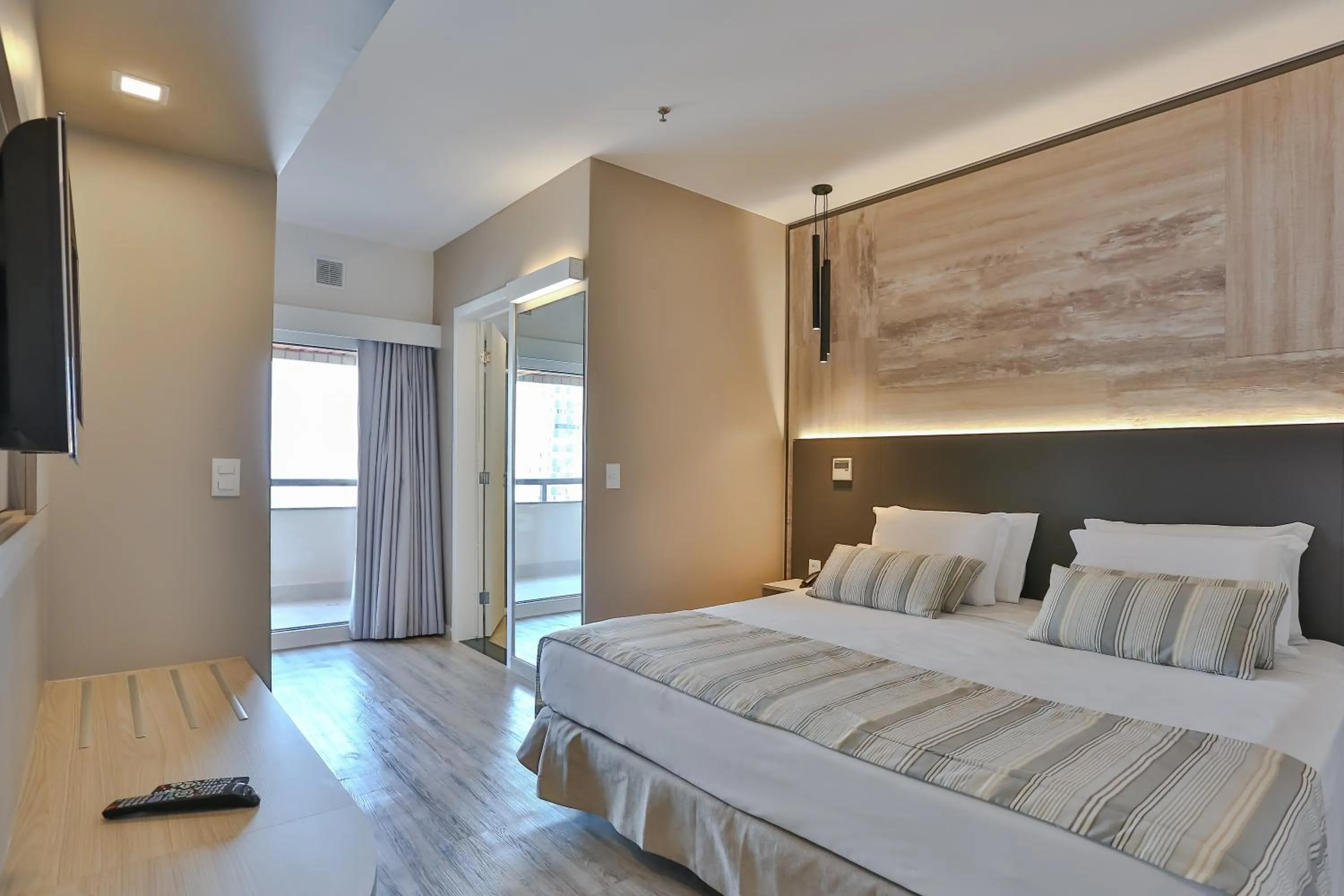 Bed in SAN MARINO SUITES HOTEL By NOBILE