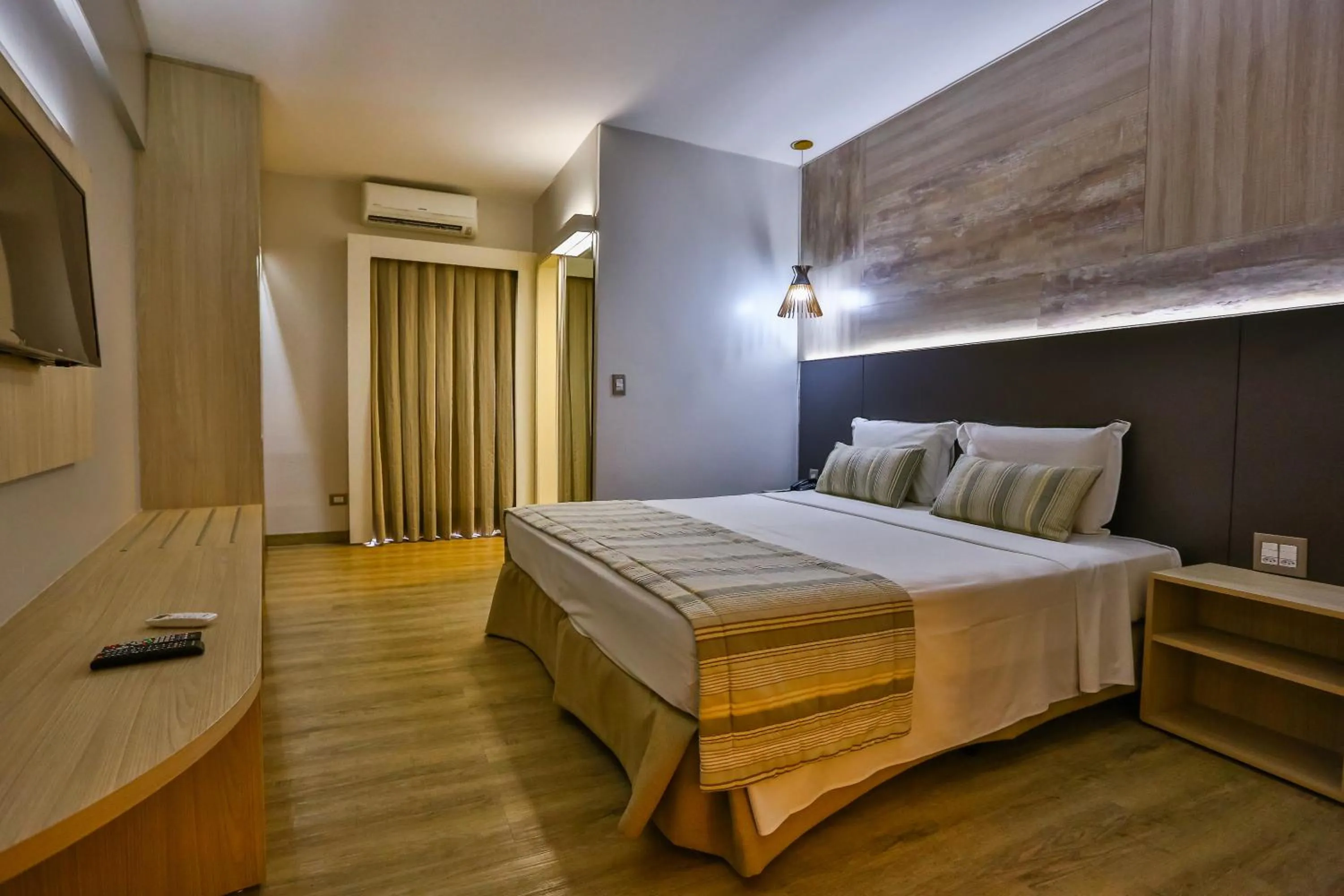 Bed in SAN MARINO SUITES HOTEL By NOBILE