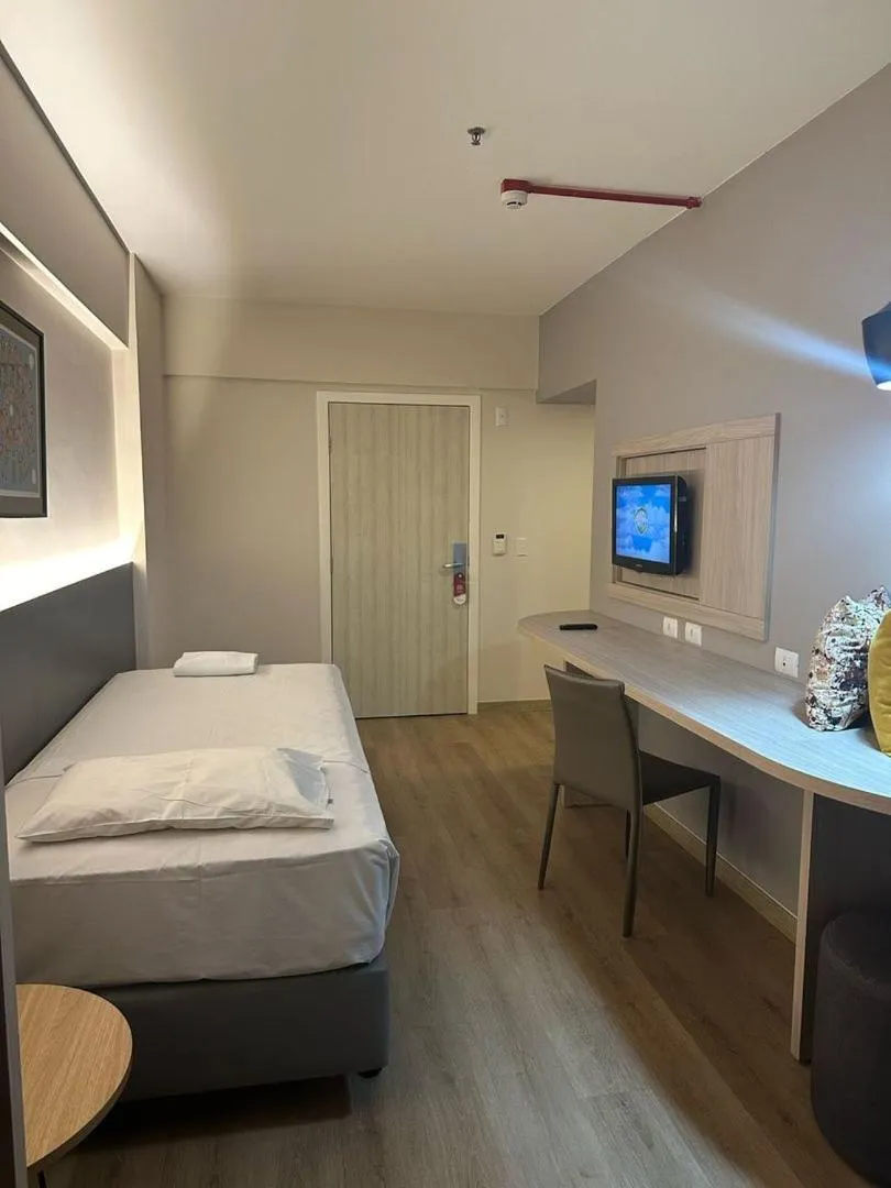 Bed in SAN MARINO SUITES HOTEL By NOBILE