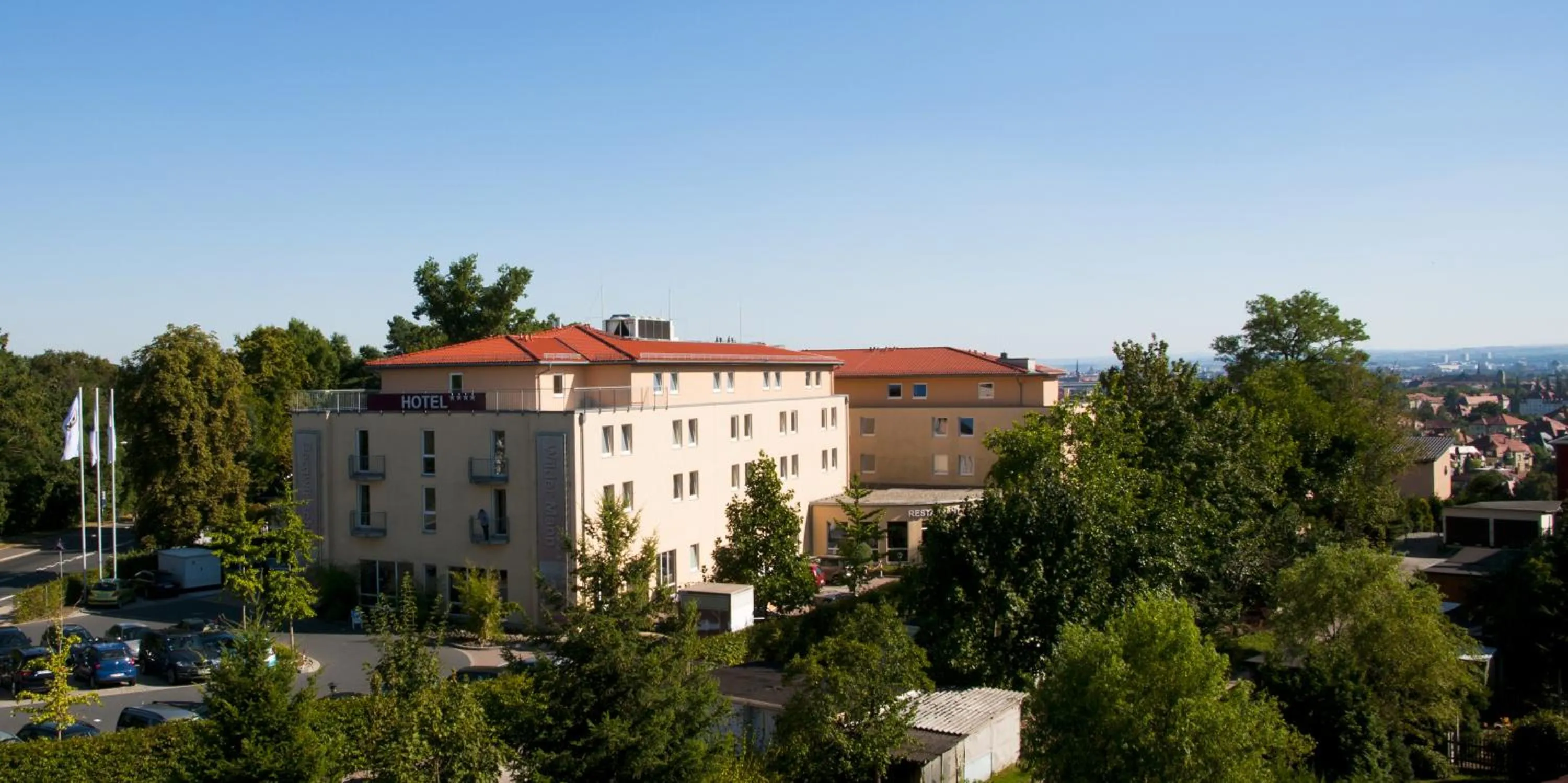 Property building in Bergwirtschaft Wilder Mann Hotel und Restaurant