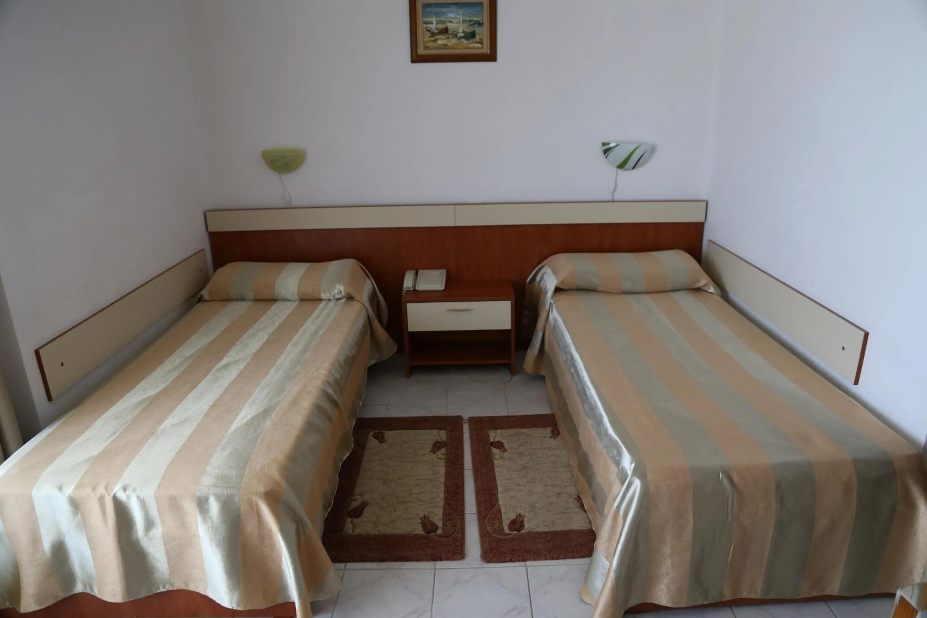 Bed in Hotel Orfeu