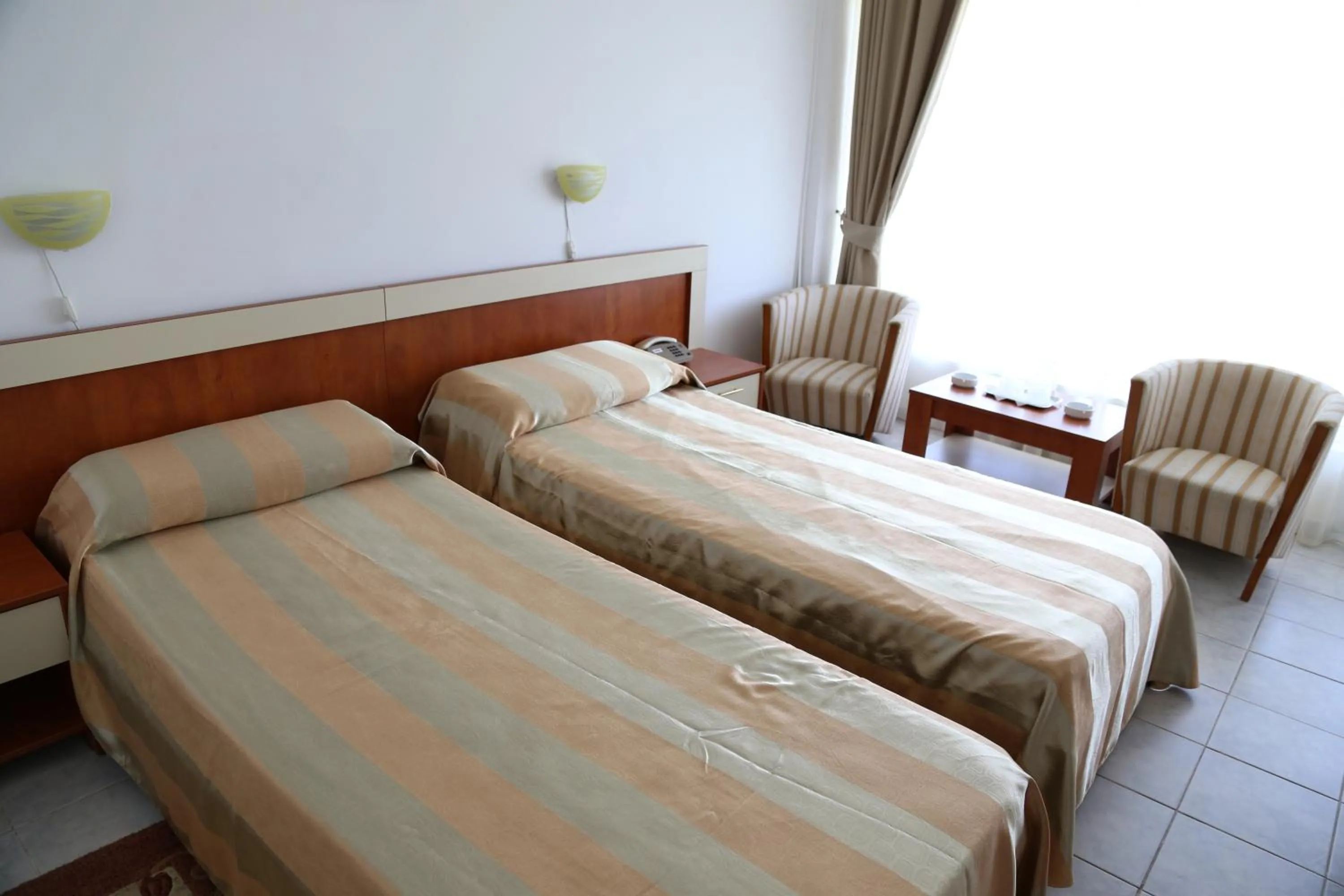 Bed in Hotel Orfeu