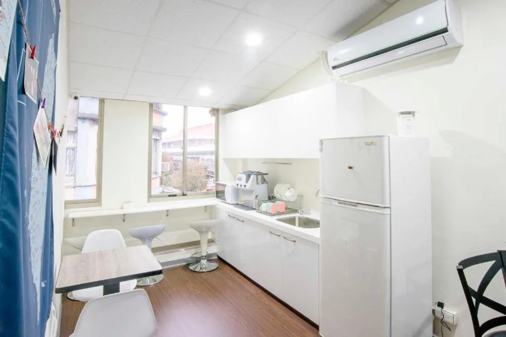 Kitchen or kitchenette in Old Door Hostel & Bar