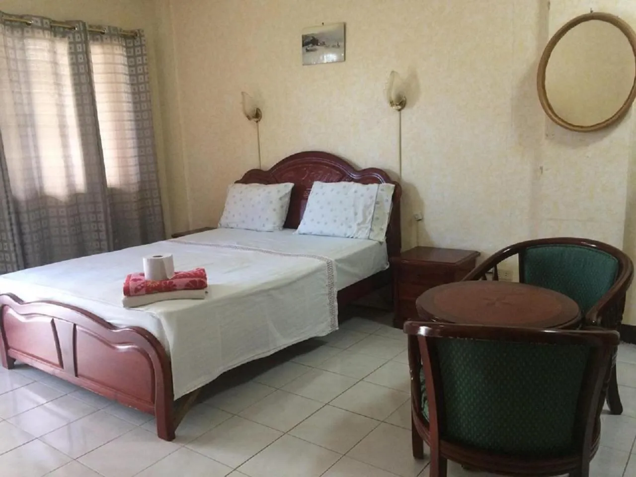 Bed in Sunrise Apartelle