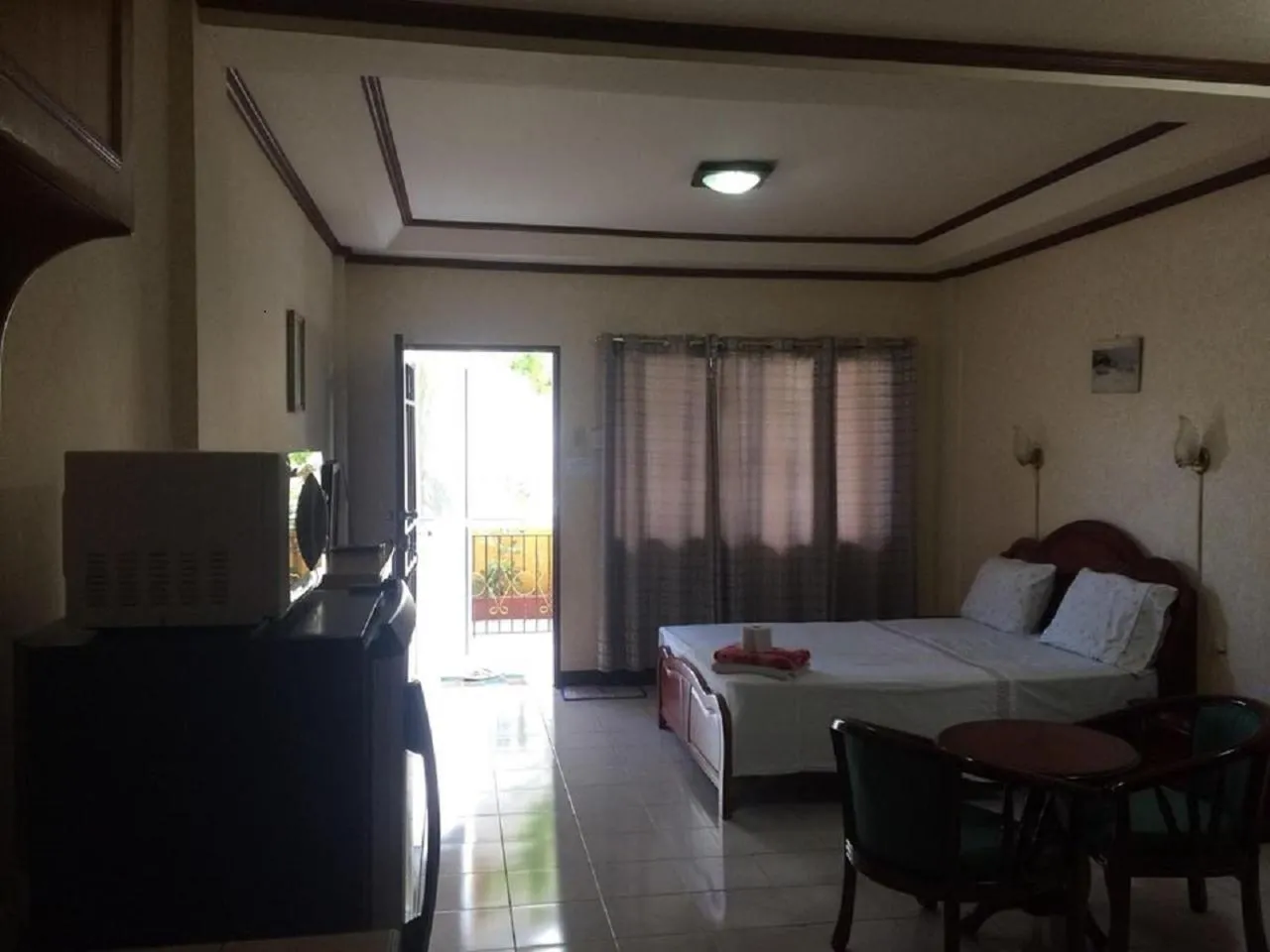 Bed in Sunrise Apartelle