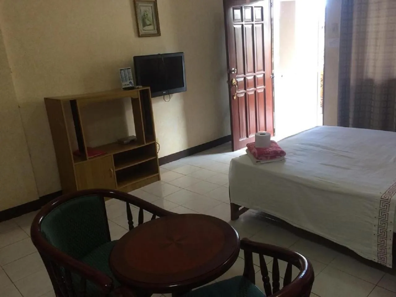 Bed in Sunrise Apartelle