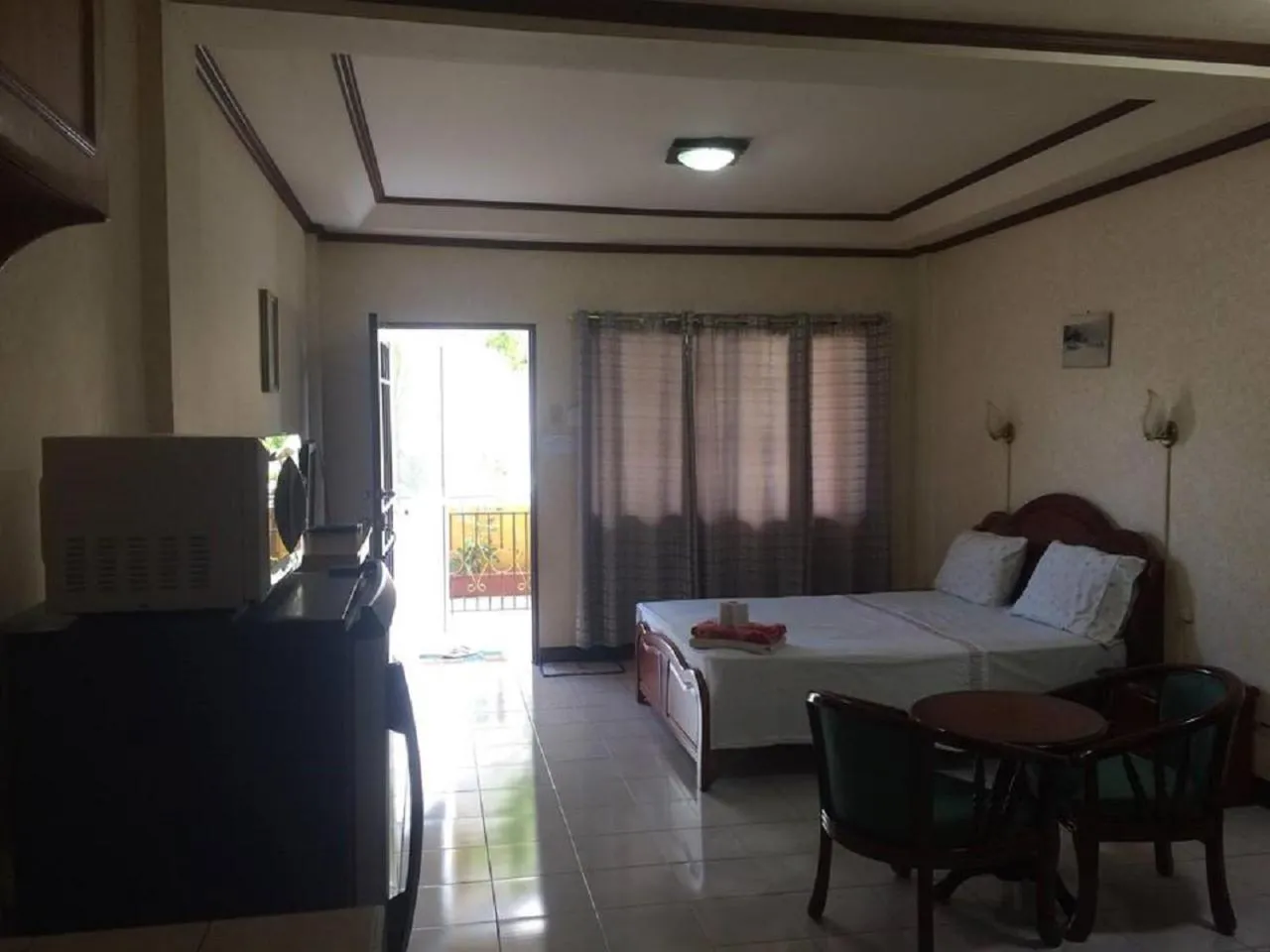 Bed in Sunrise Apartelle