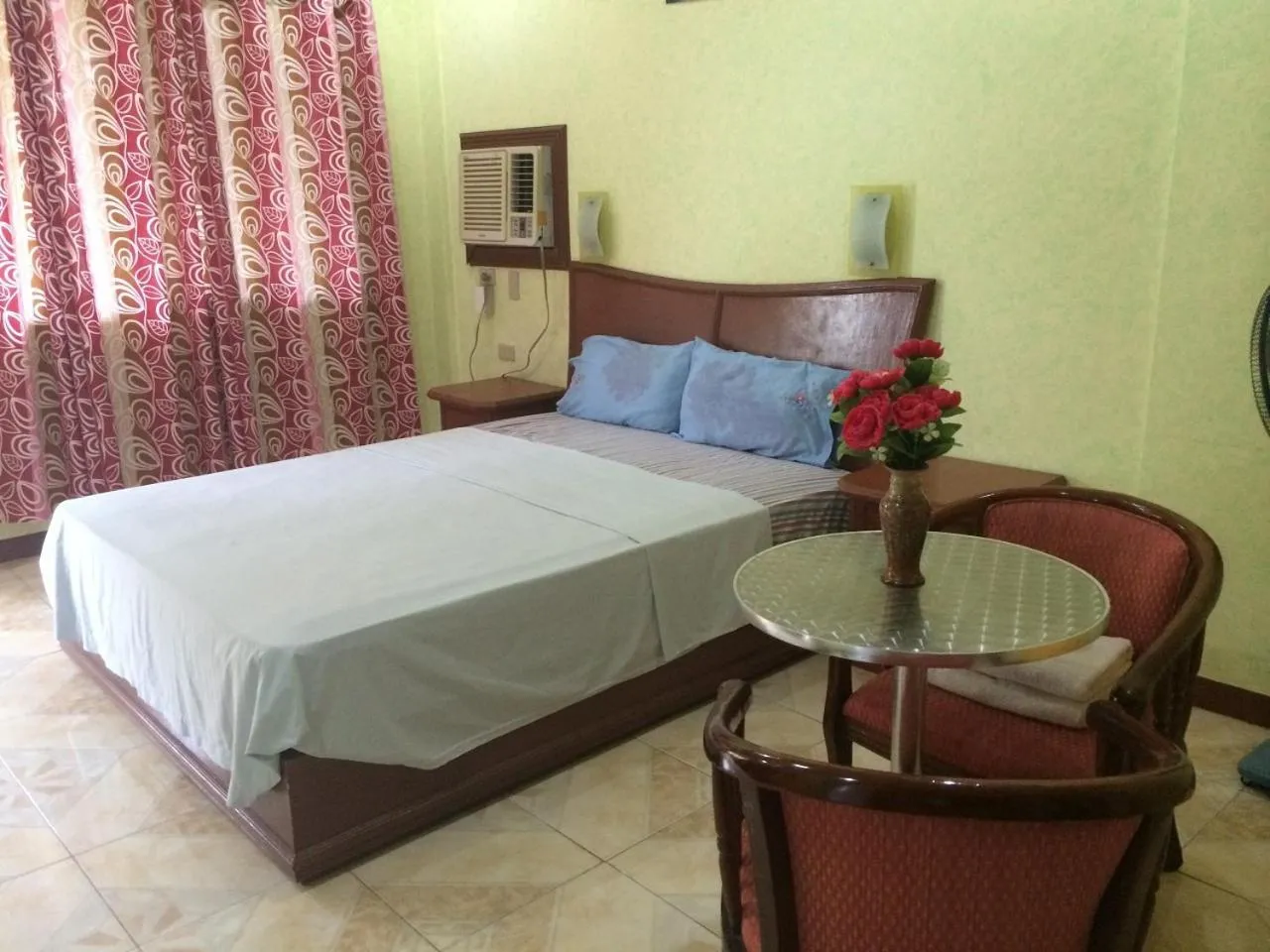 Bed in Sunrise Apartelle