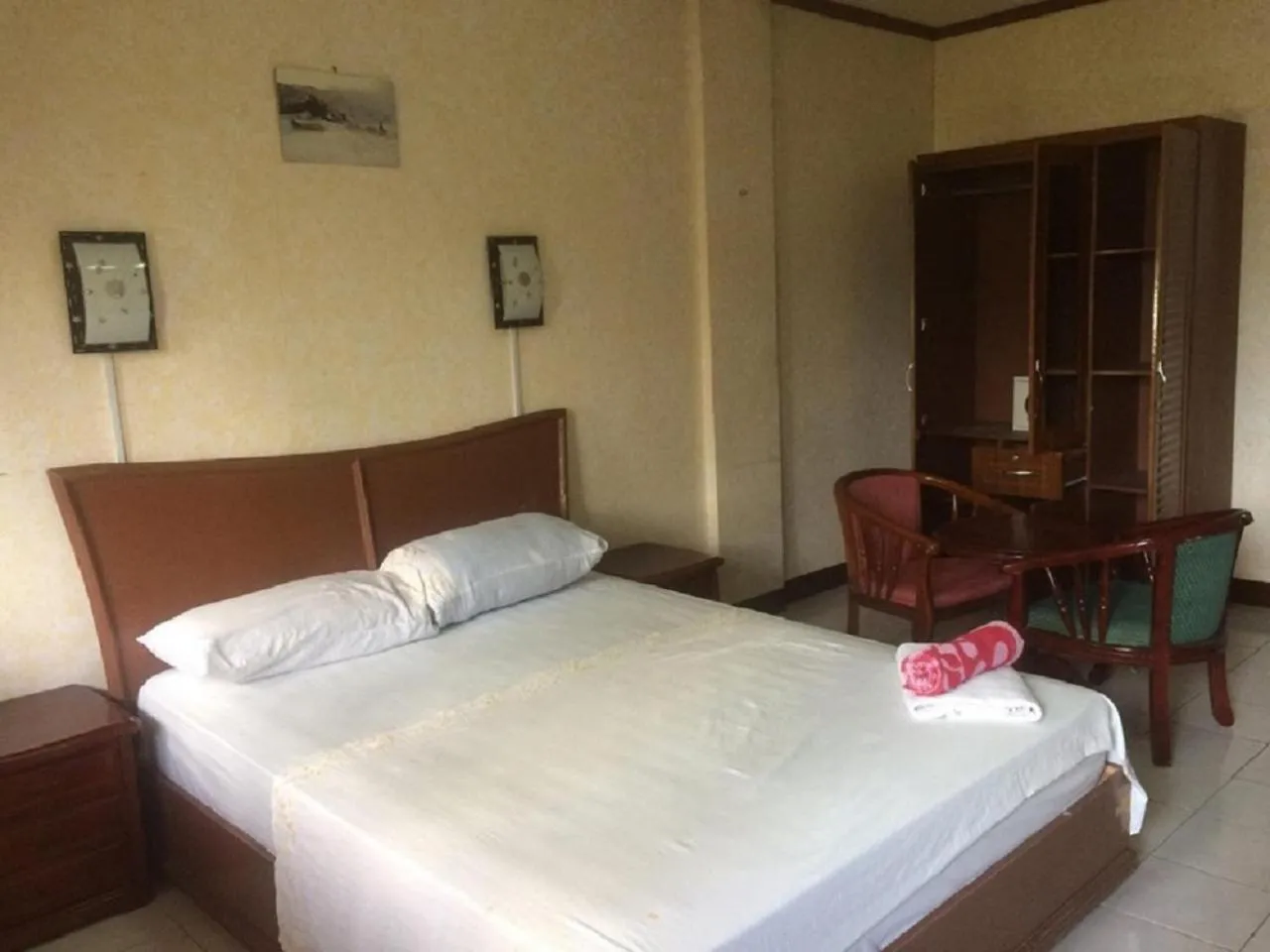 Bed in Sunrise Apartelle