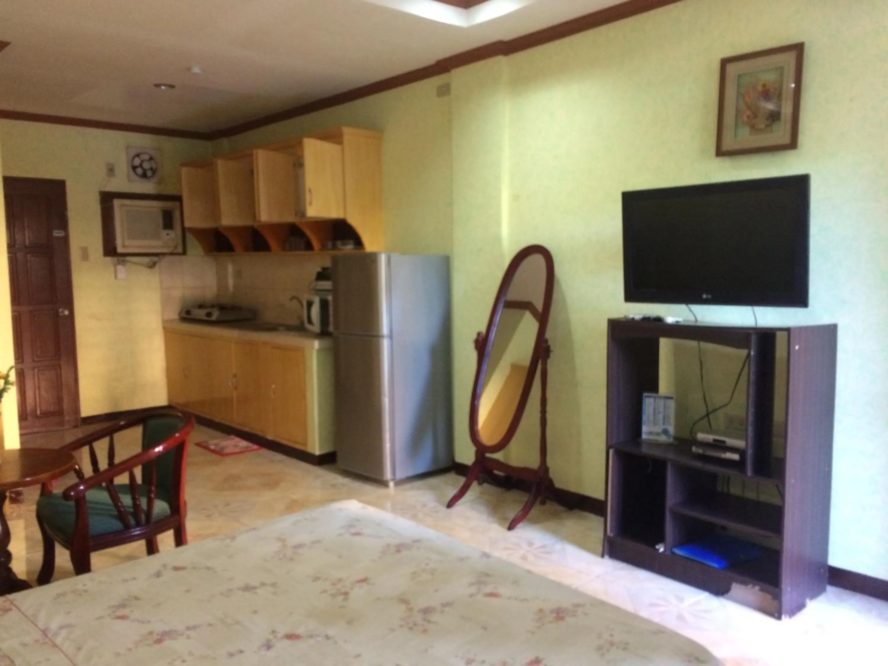 Bed in Sunrise Apartelle