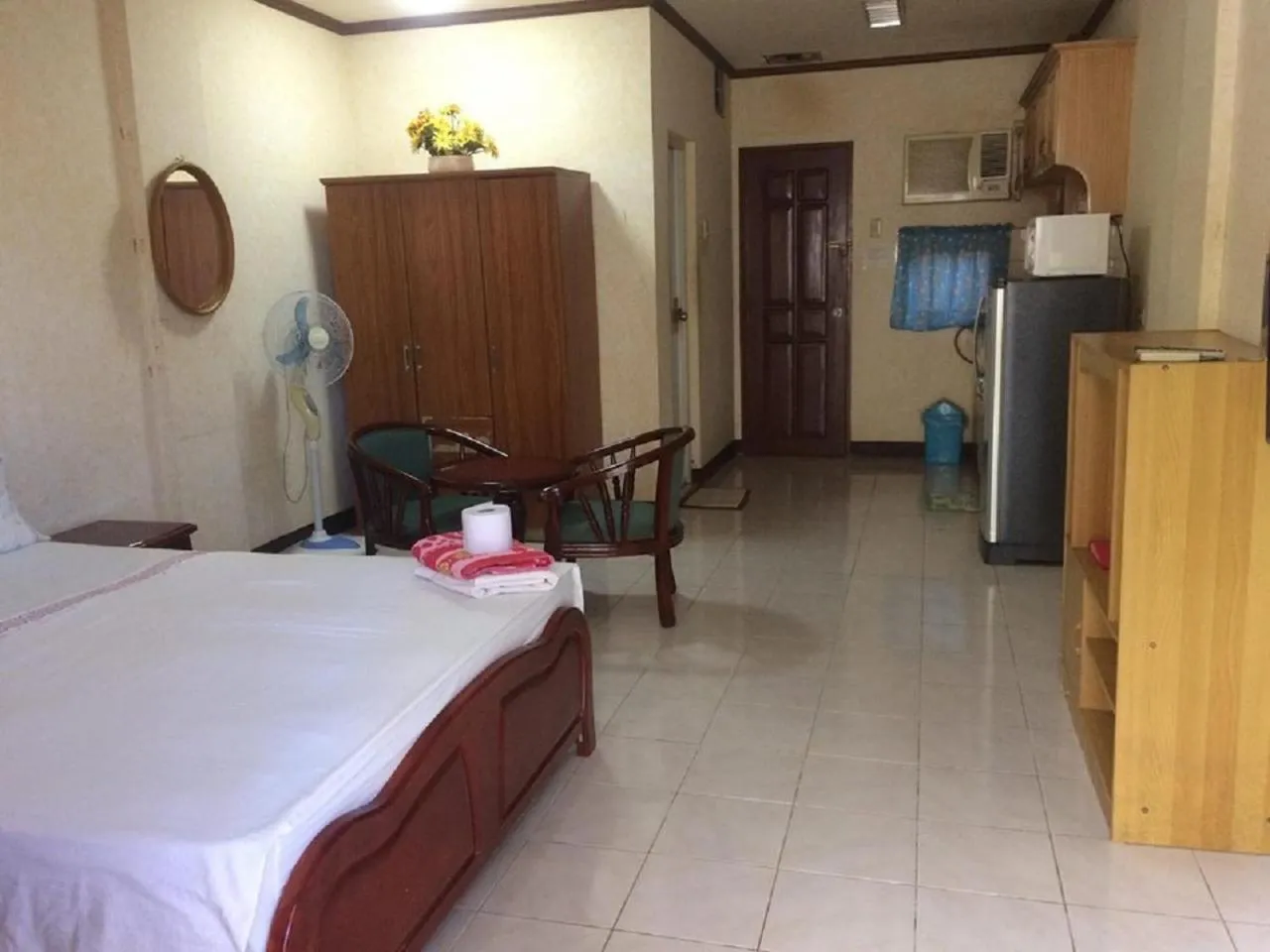 Bed in Sunrise Apartelle
