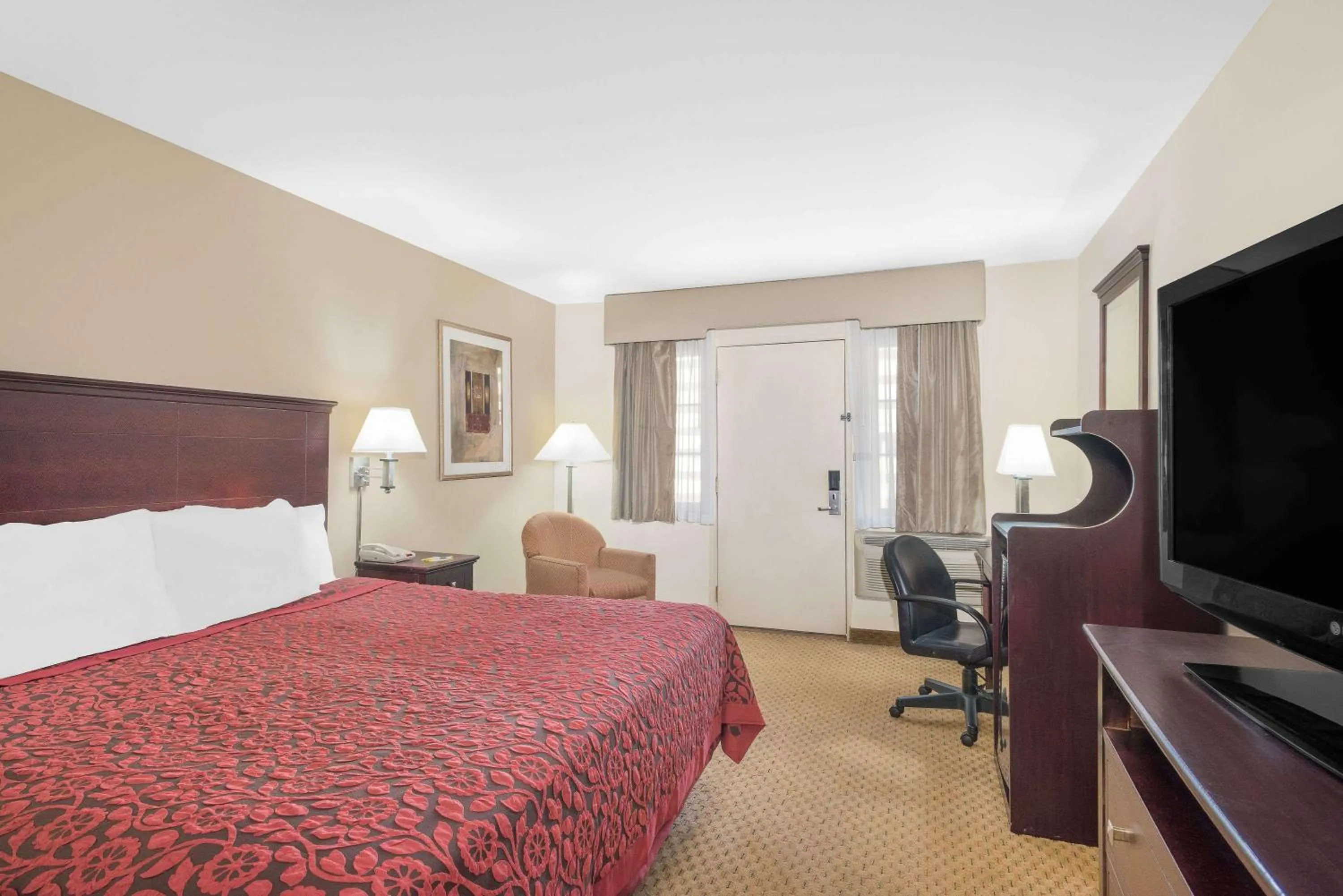 Photo of the whole room, Bed in Days Inn by Wyndham Springfield/Phil.Intl Airport