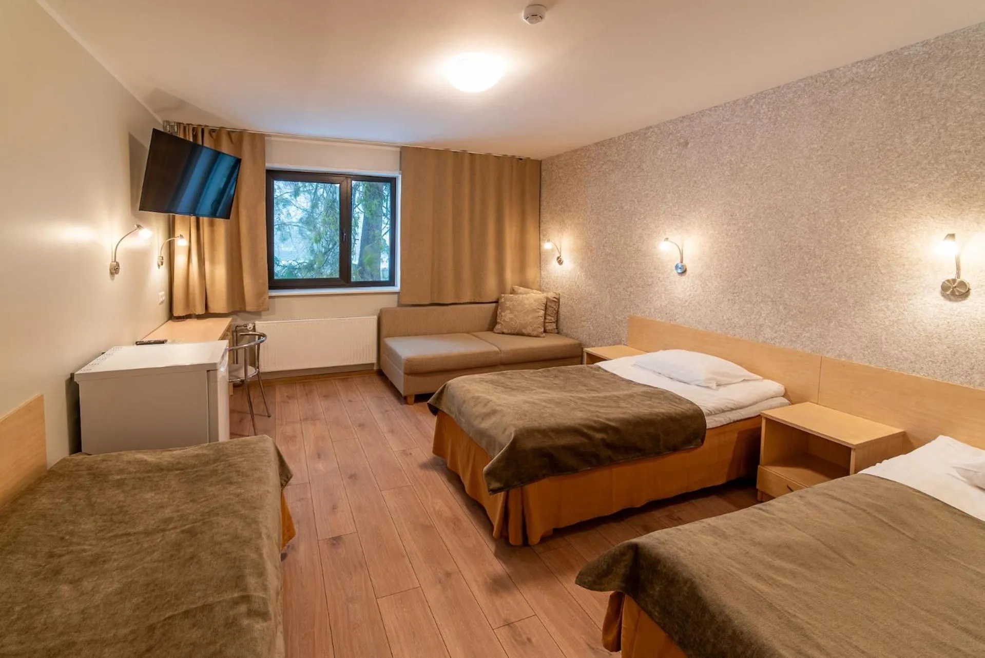 Bed in Hotel Karupesa