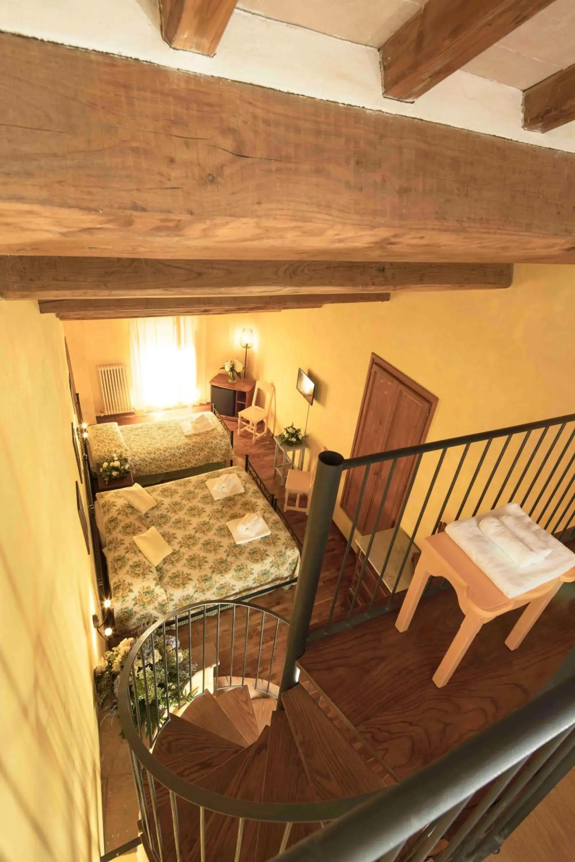 Photo of the whole room, Bed in Castello di Titignano Photo of the whole room, Bed in Castello di Titignano