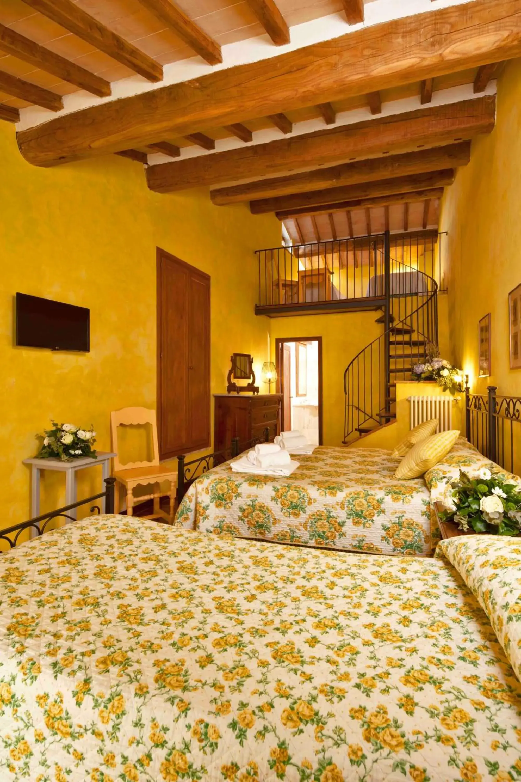 Photo of the whole room, Bed in Castello di Titignano Photo of the whole room, Bed in Castello di Titignano